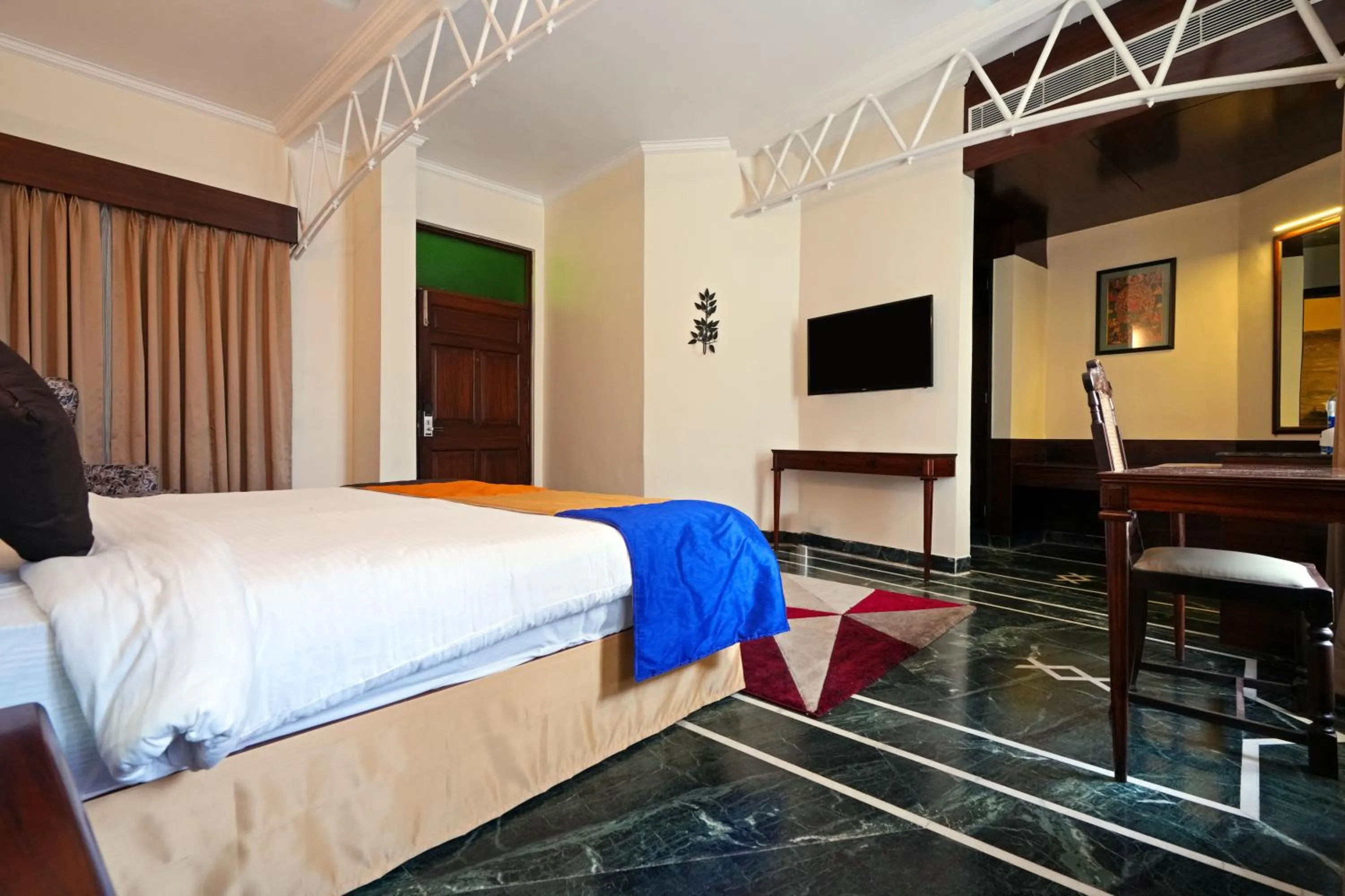 Bed in WelcomHeritage Taragarh Palace