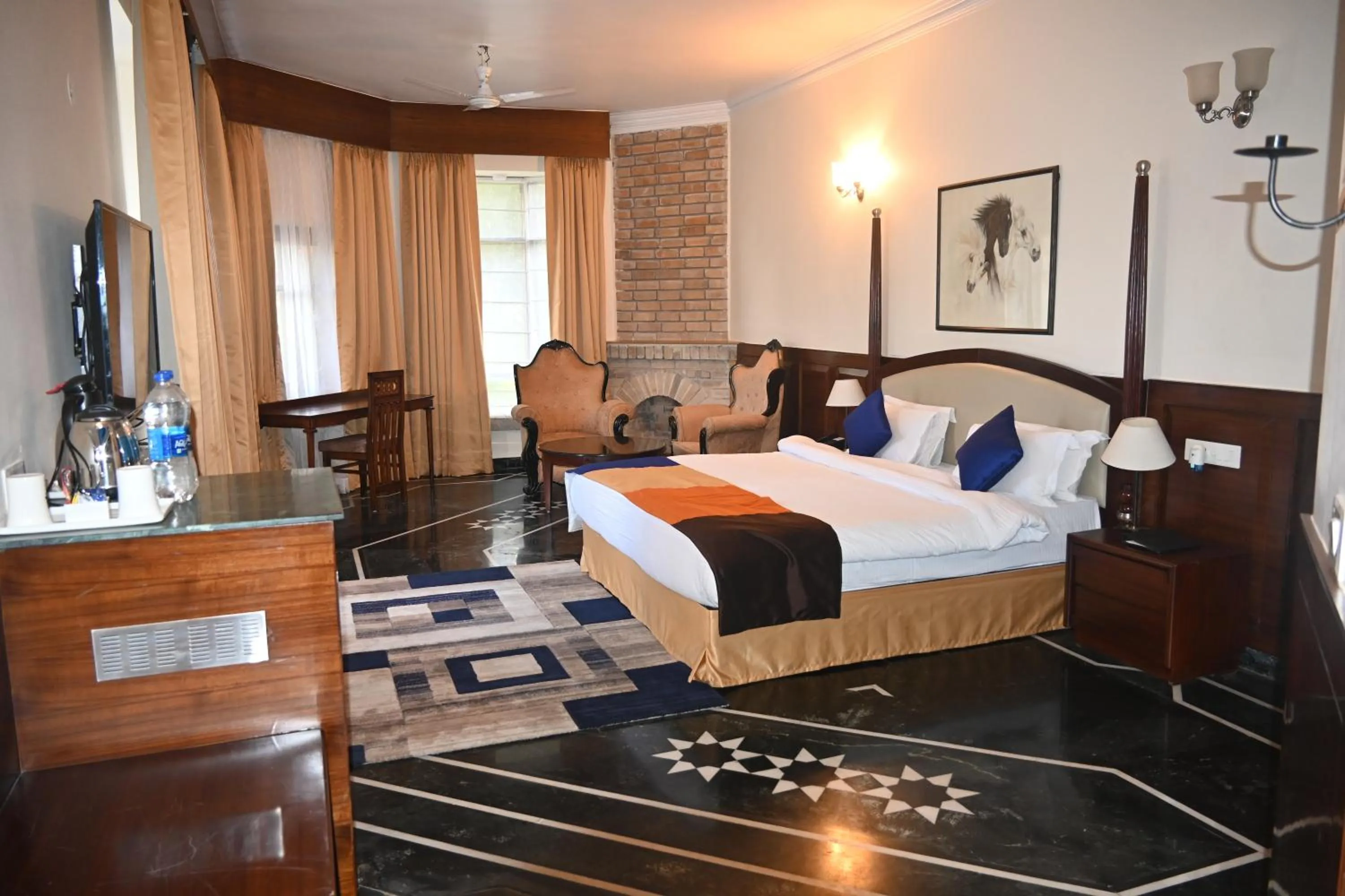 Bed in WelcomHeritage Taragarh Palace