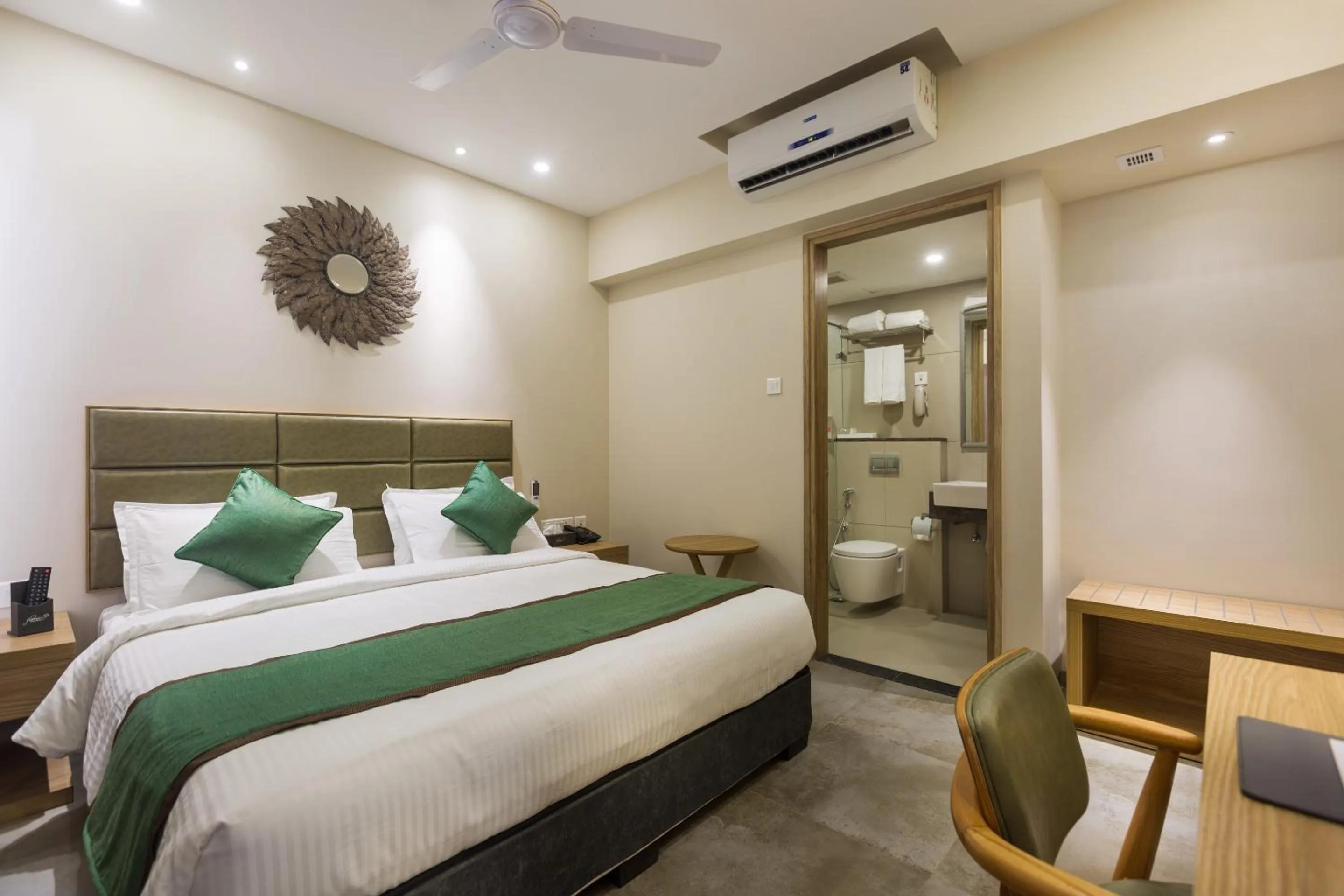 Bed in Floressa Randa Business Hotel