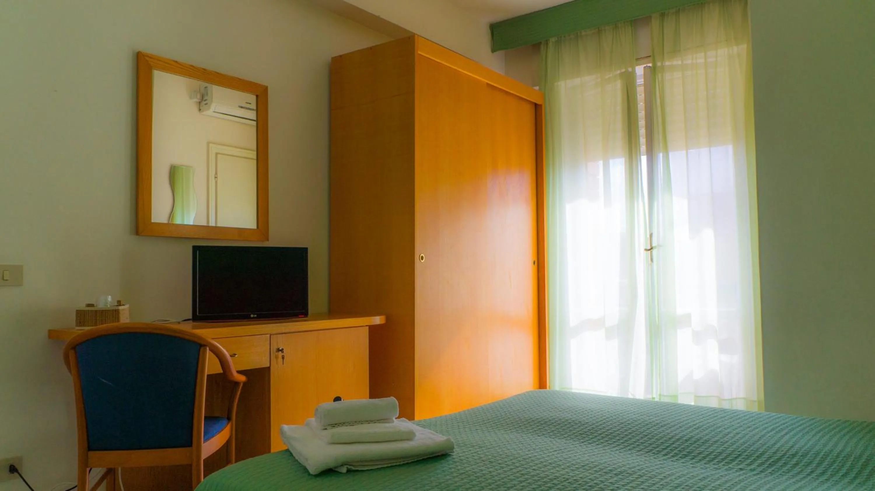 Bedroom in Piccolo Hotel