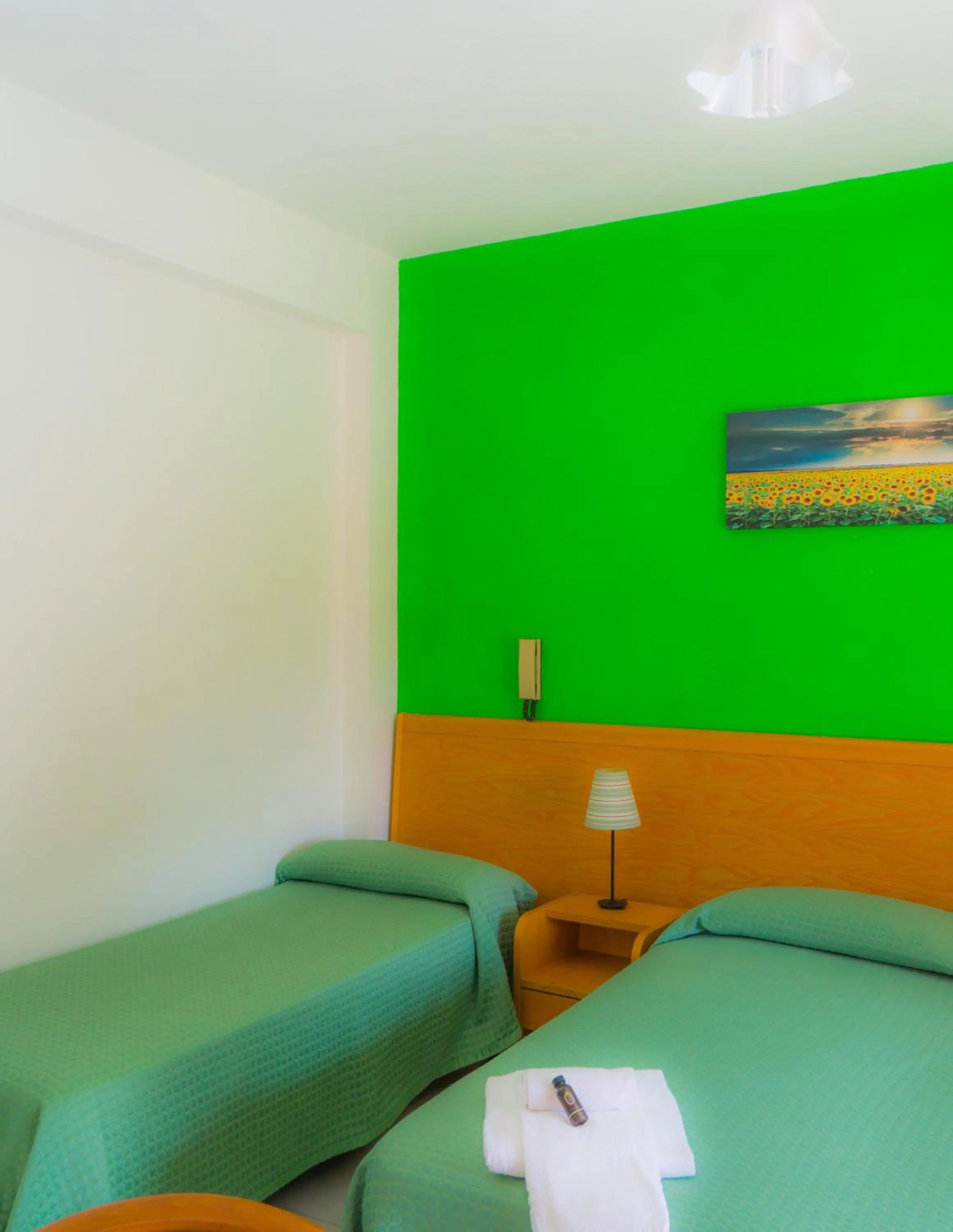 Bed in Piccolo Hotel