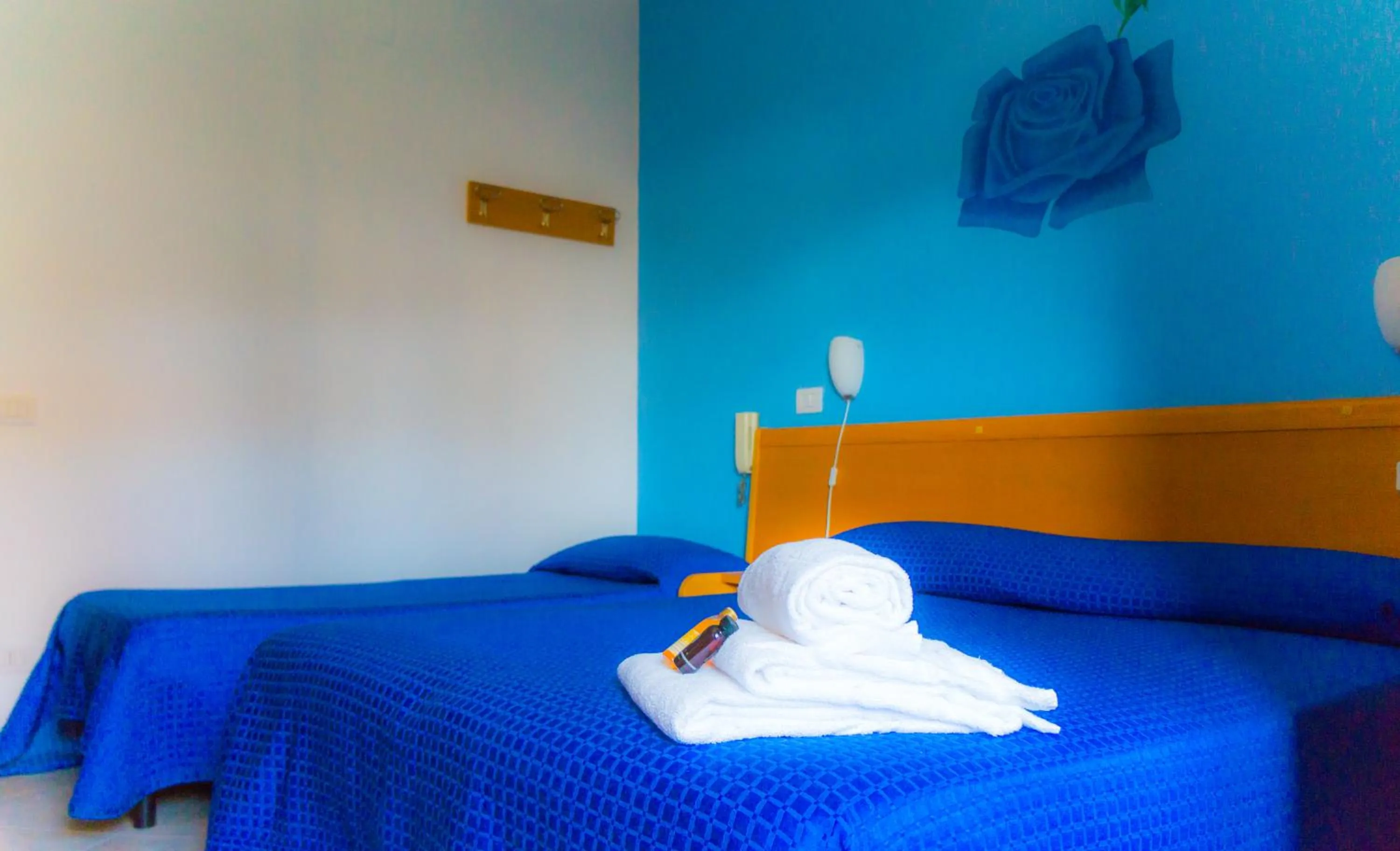 Bed in Piccolo Hotel