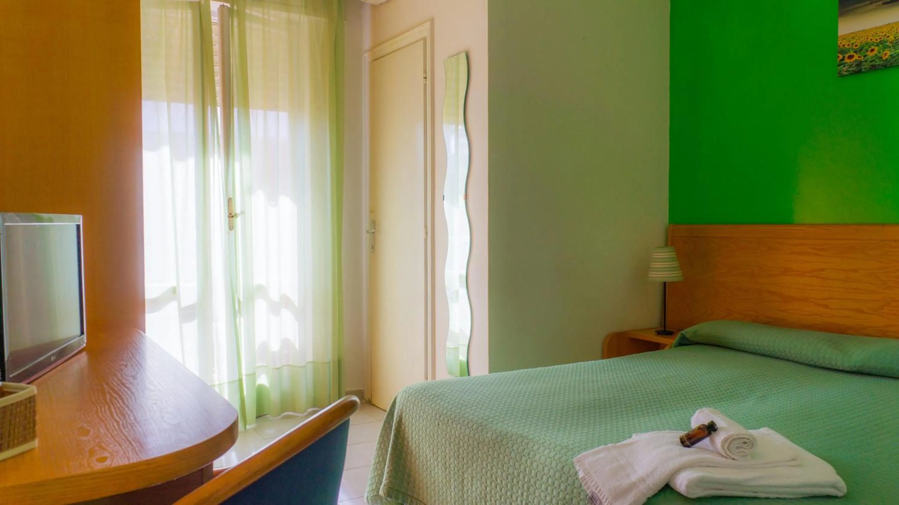 Bed in Piccolo Hotel