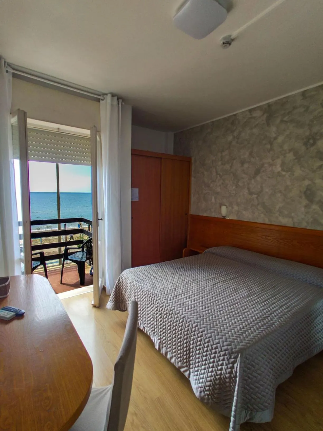 Bed in Piccolo Hotel