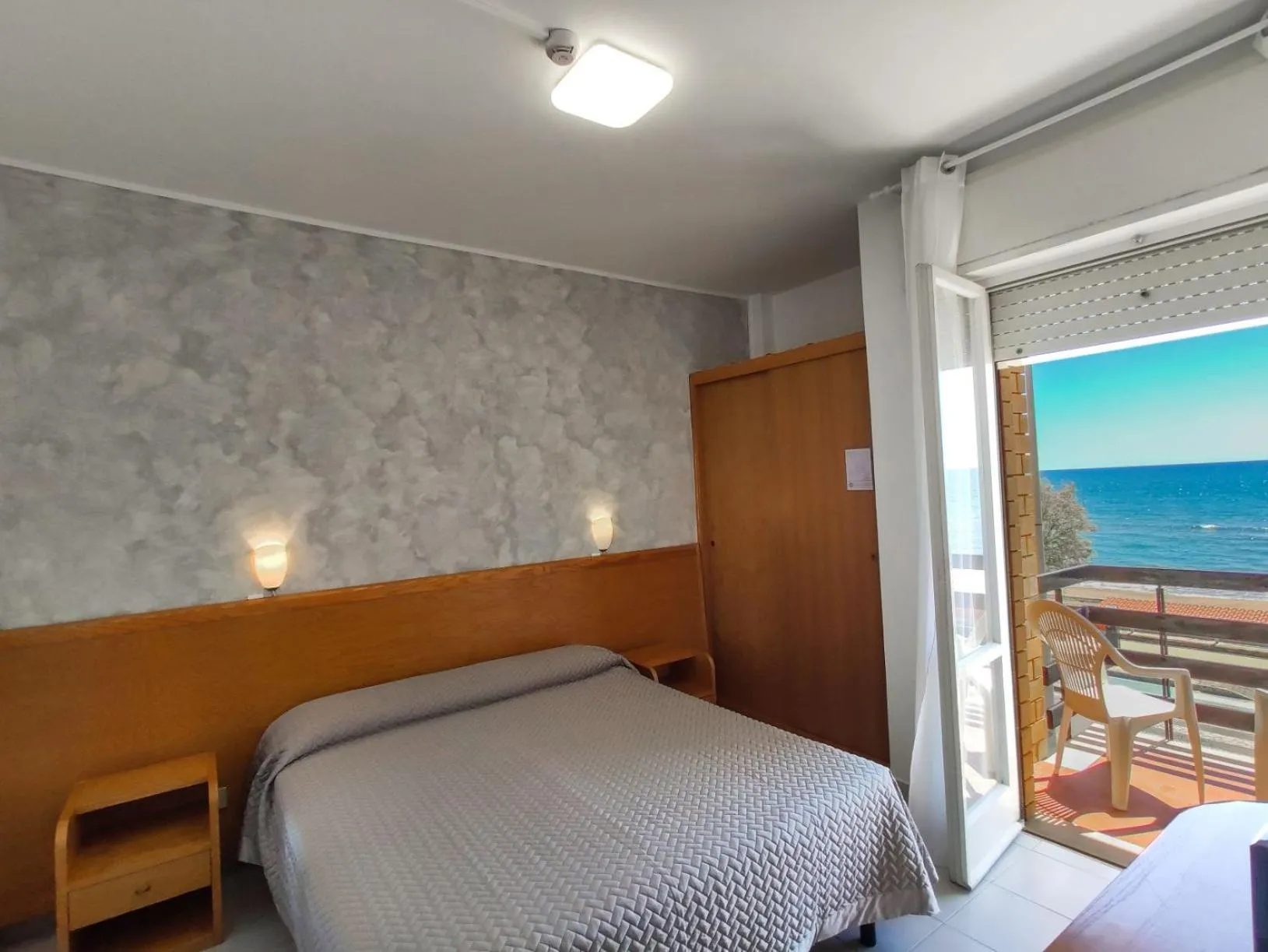 Bed in Piccolo Hotel