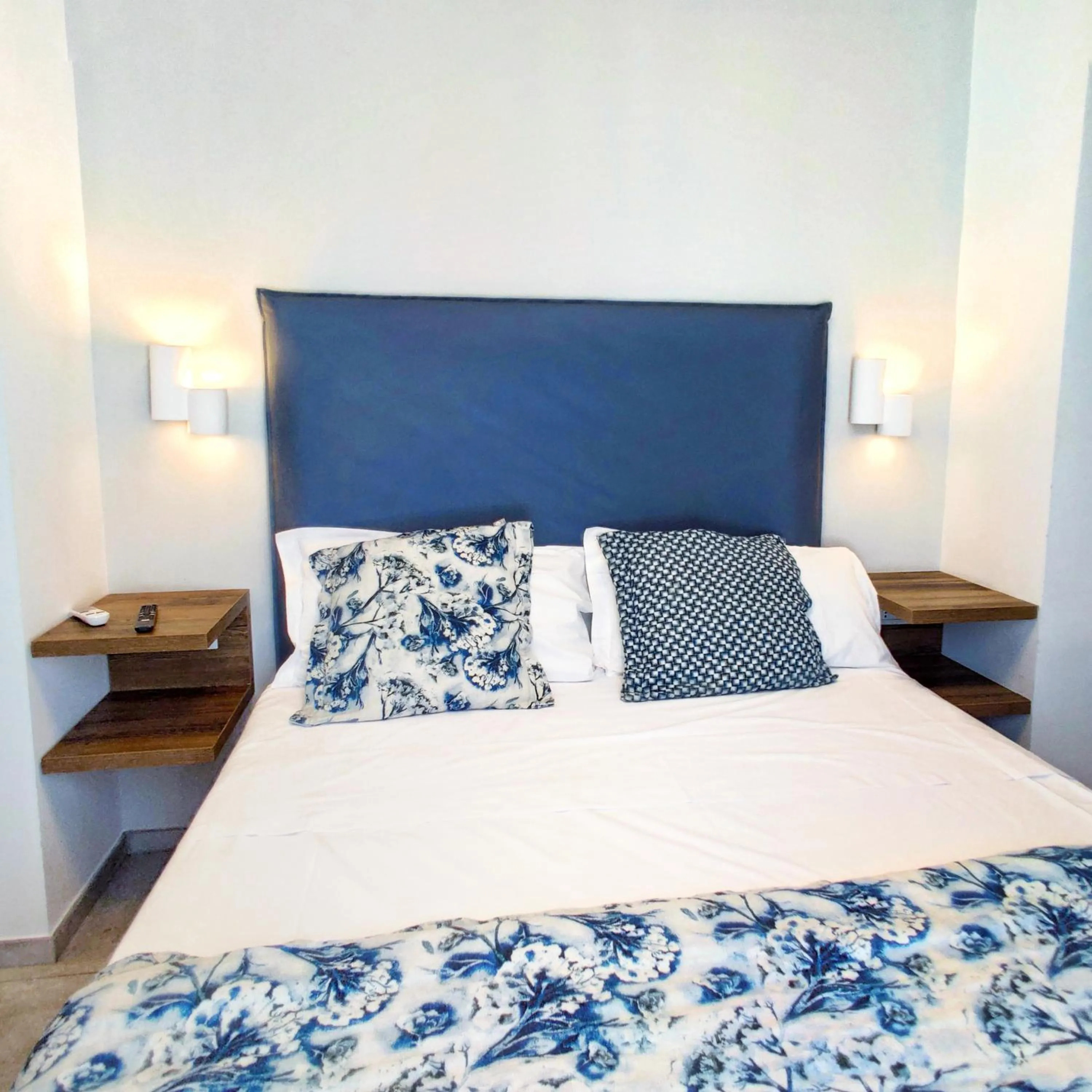 Bed in Piccolo Hotel