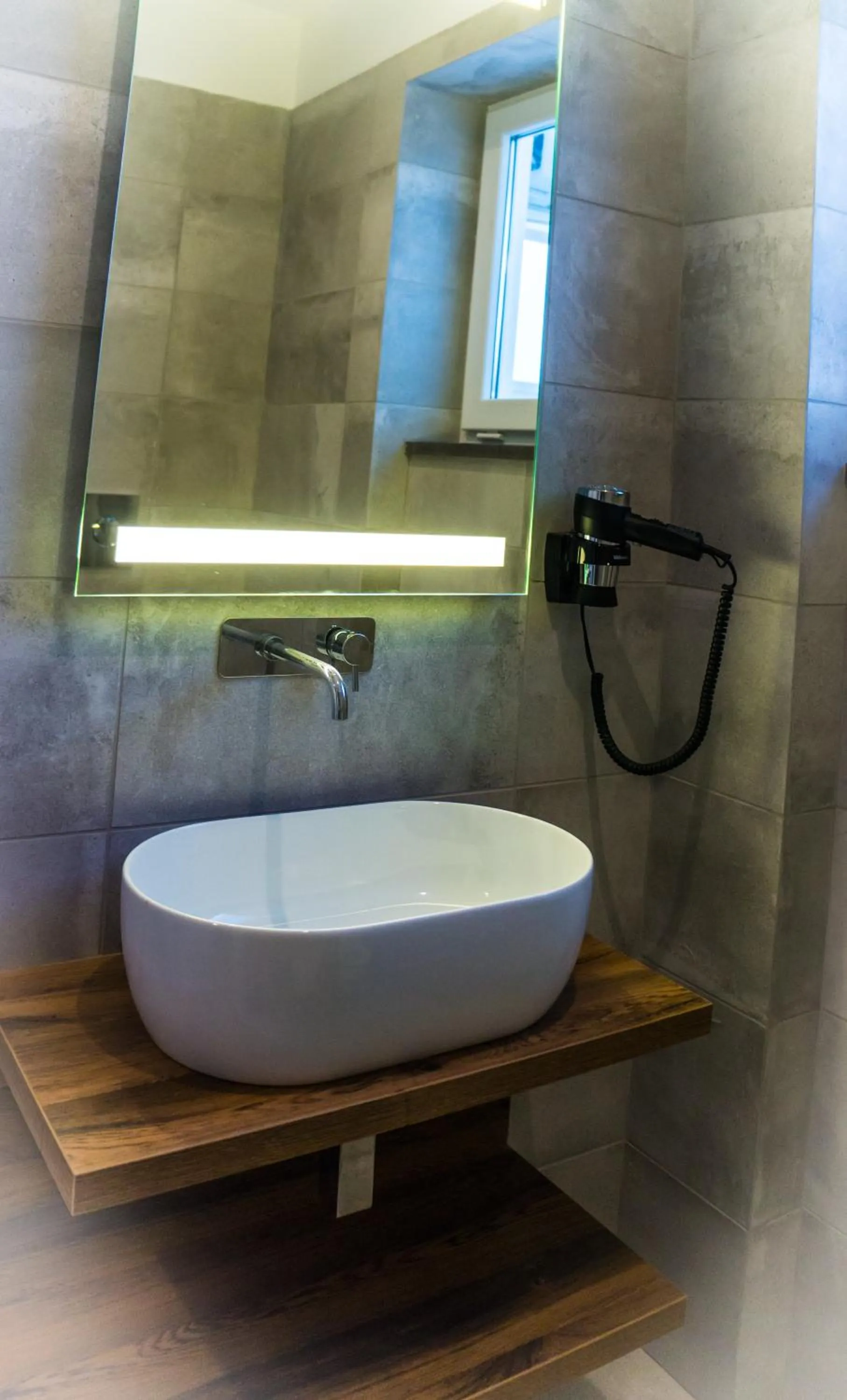 Bathroom in Piccolo Hotel