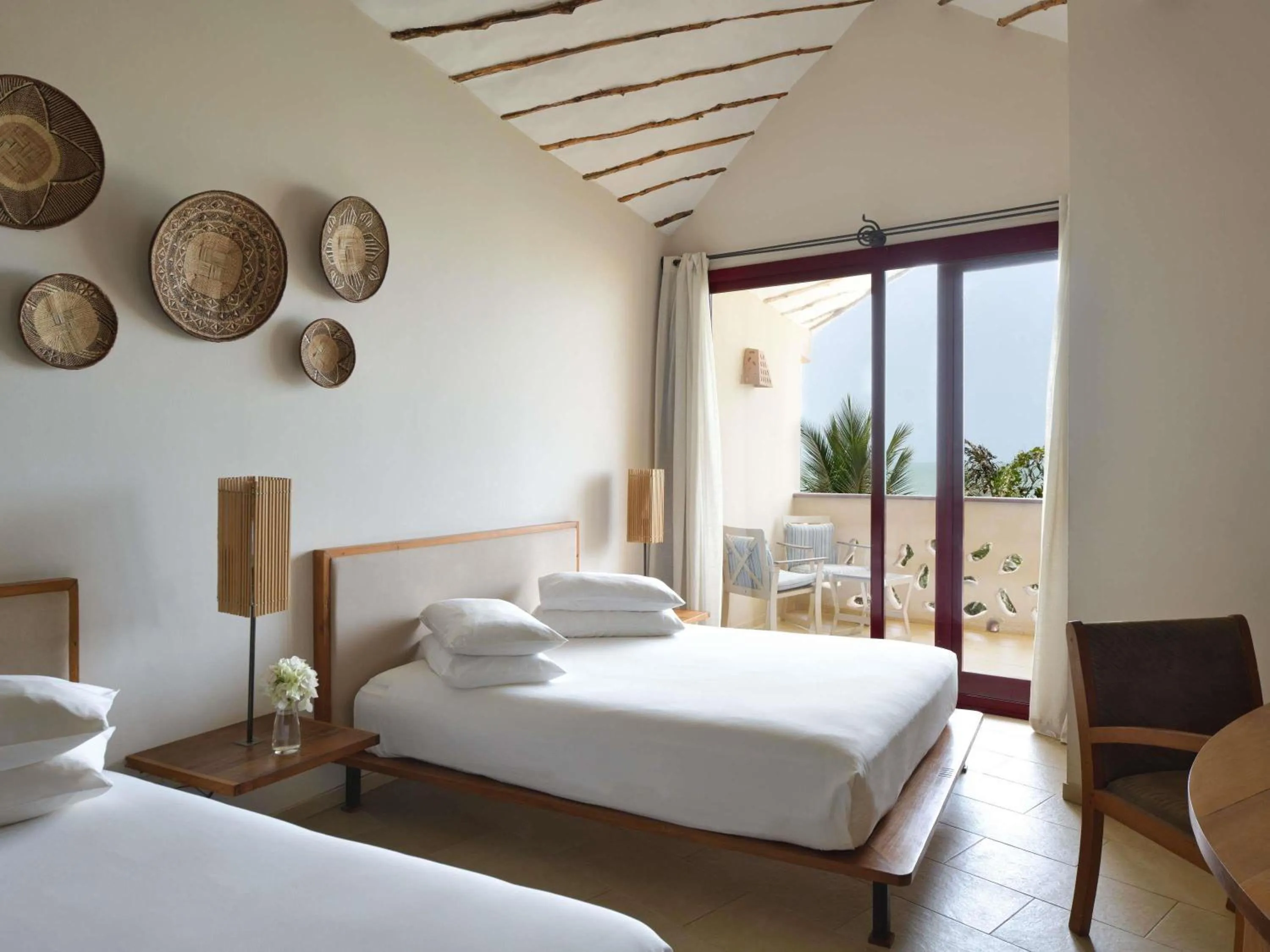 Bedroom, Bed in Movenpick Resort Lamantin Saly