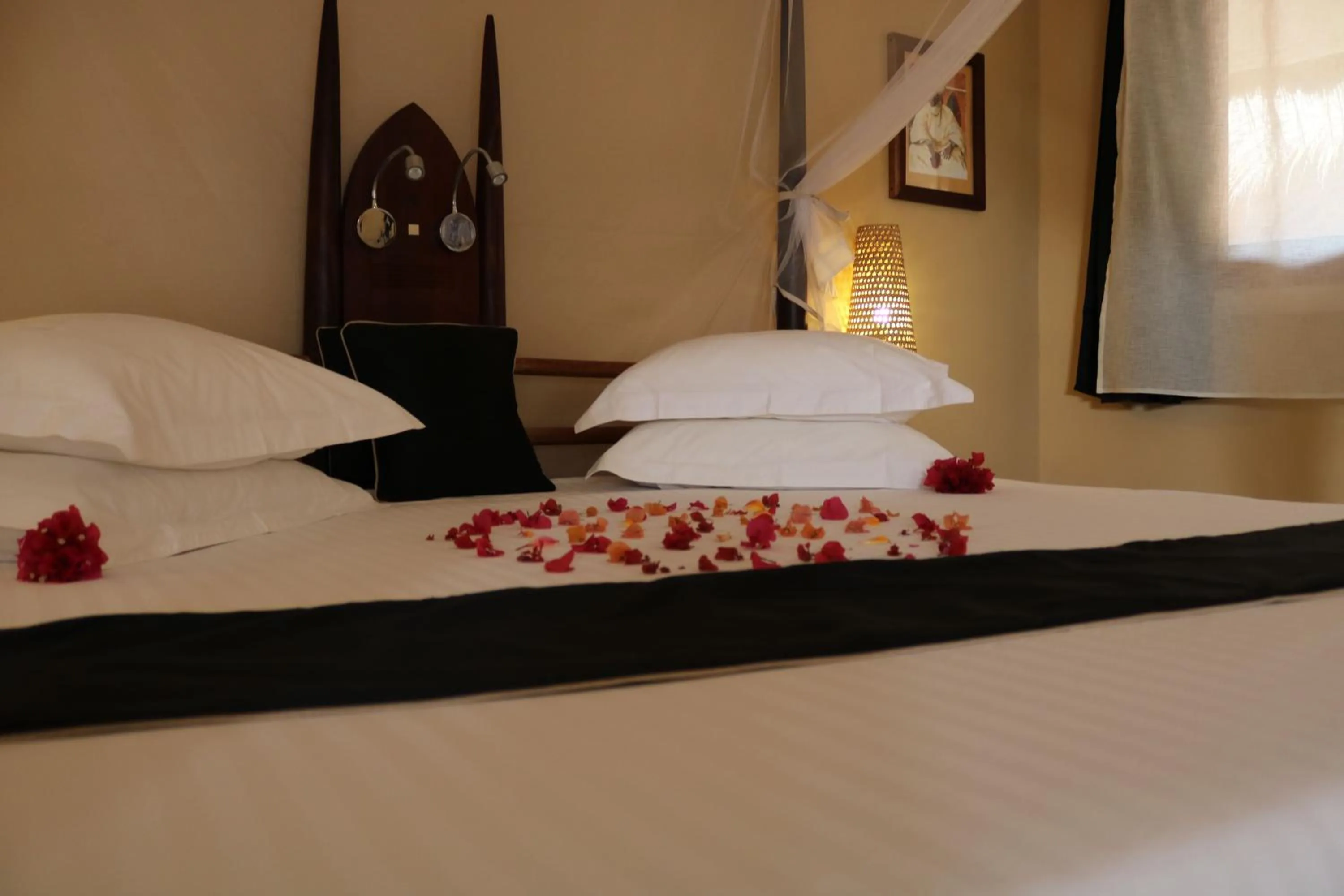 Photo of the whole room, Bed in Movenpick Resort Lamantin Saly