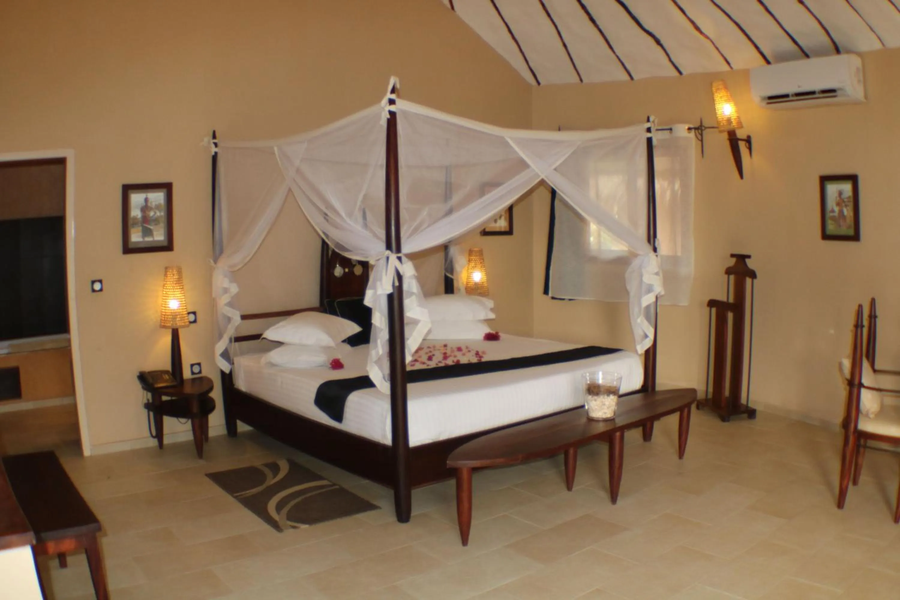 Photo of the whole room, Bed in Movenpick Resort Lamantin Saly