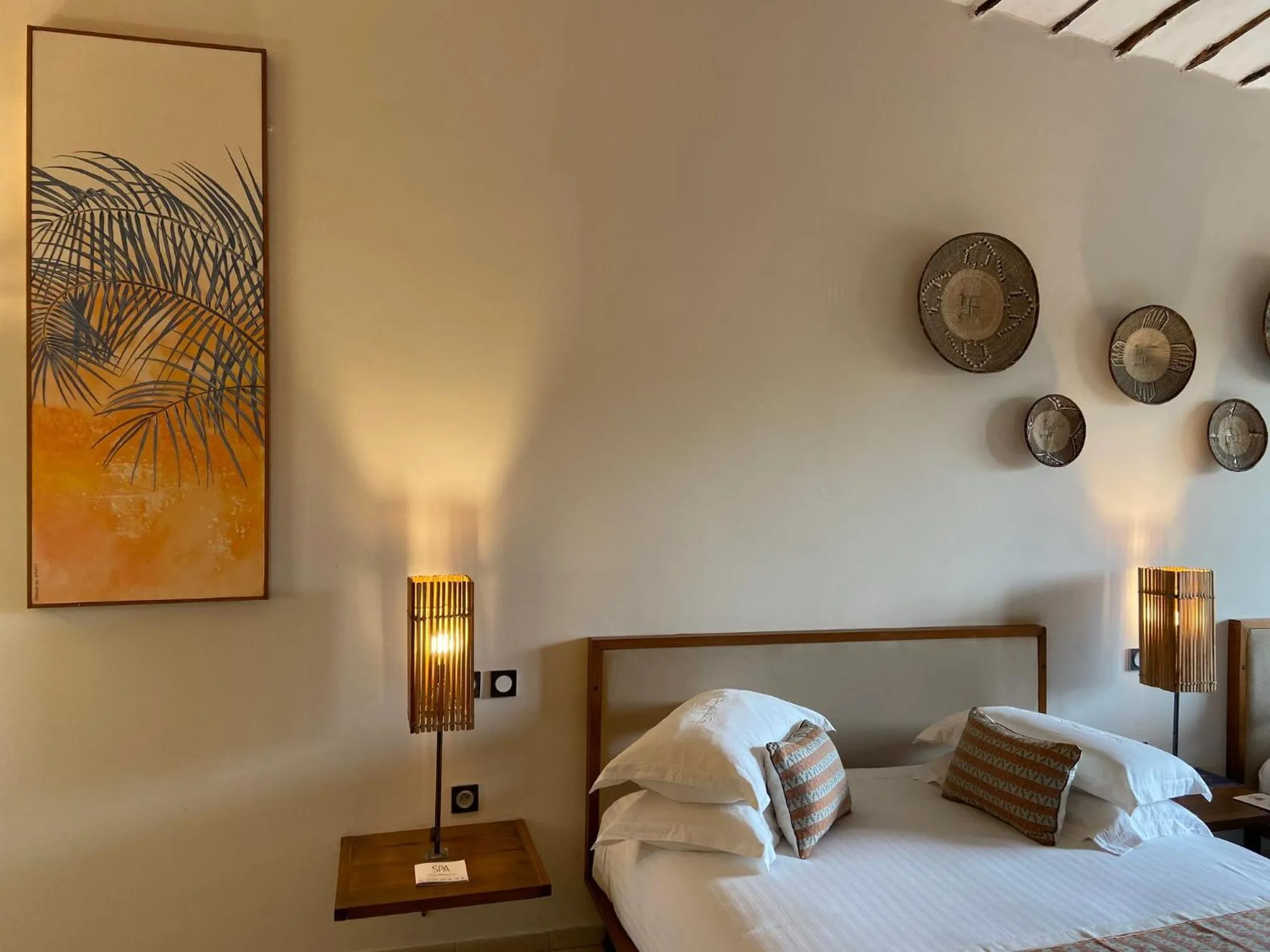 Decorative detail, Bed in Movenpick Resort Lamantin Saly