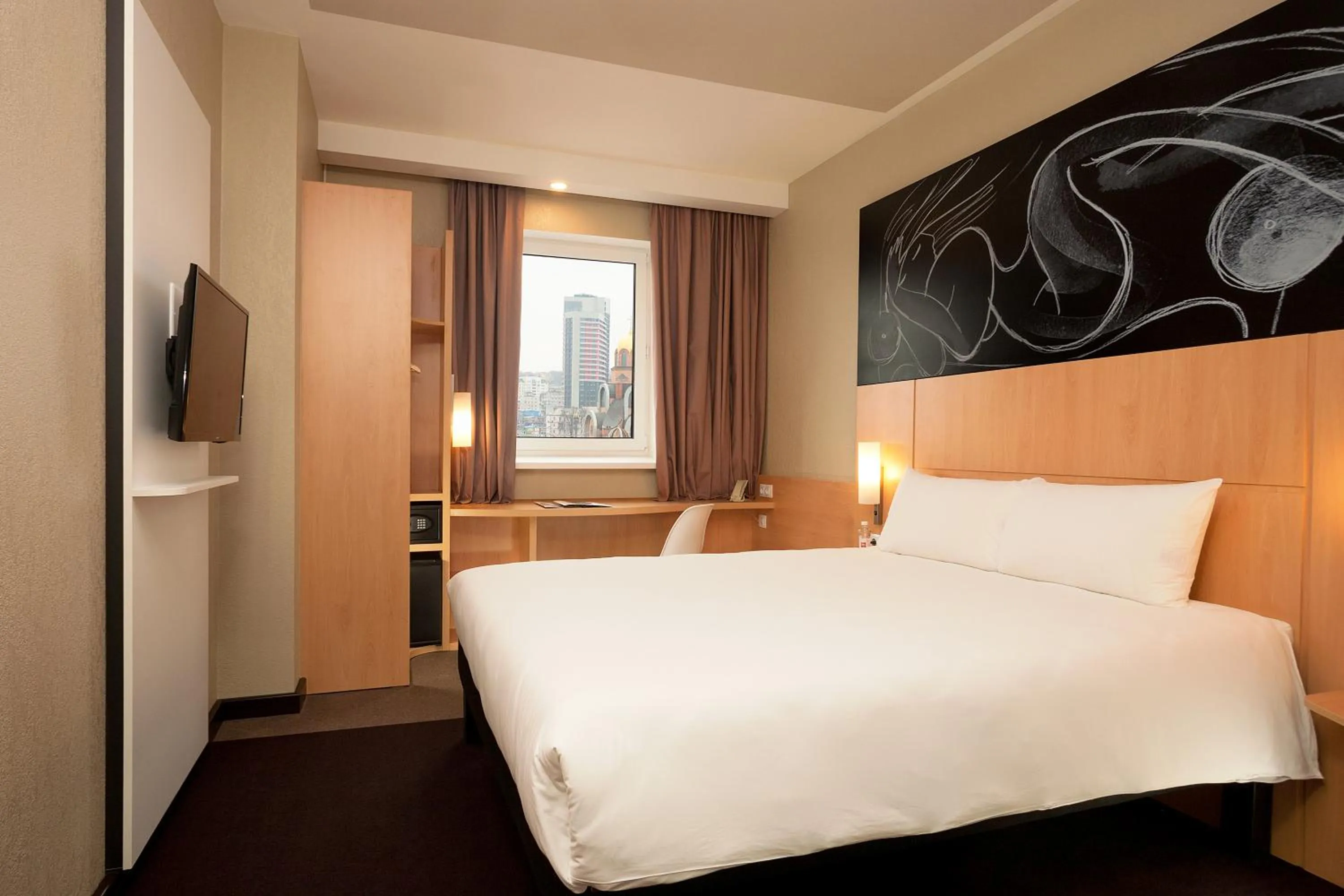 Bed in ibis Kyiv Railway Station