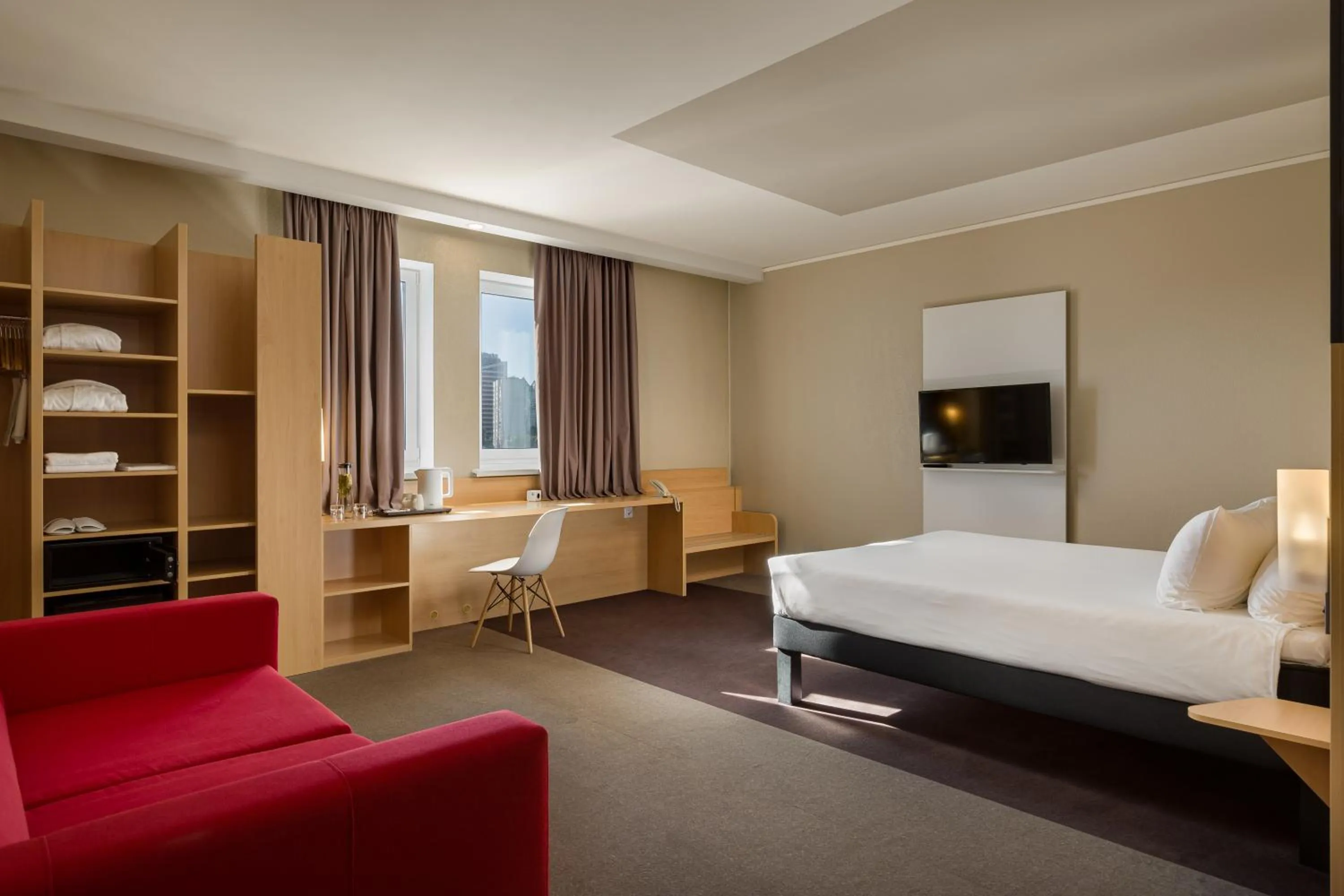 Seating area, Bed in ibis Kyiv Railway Station