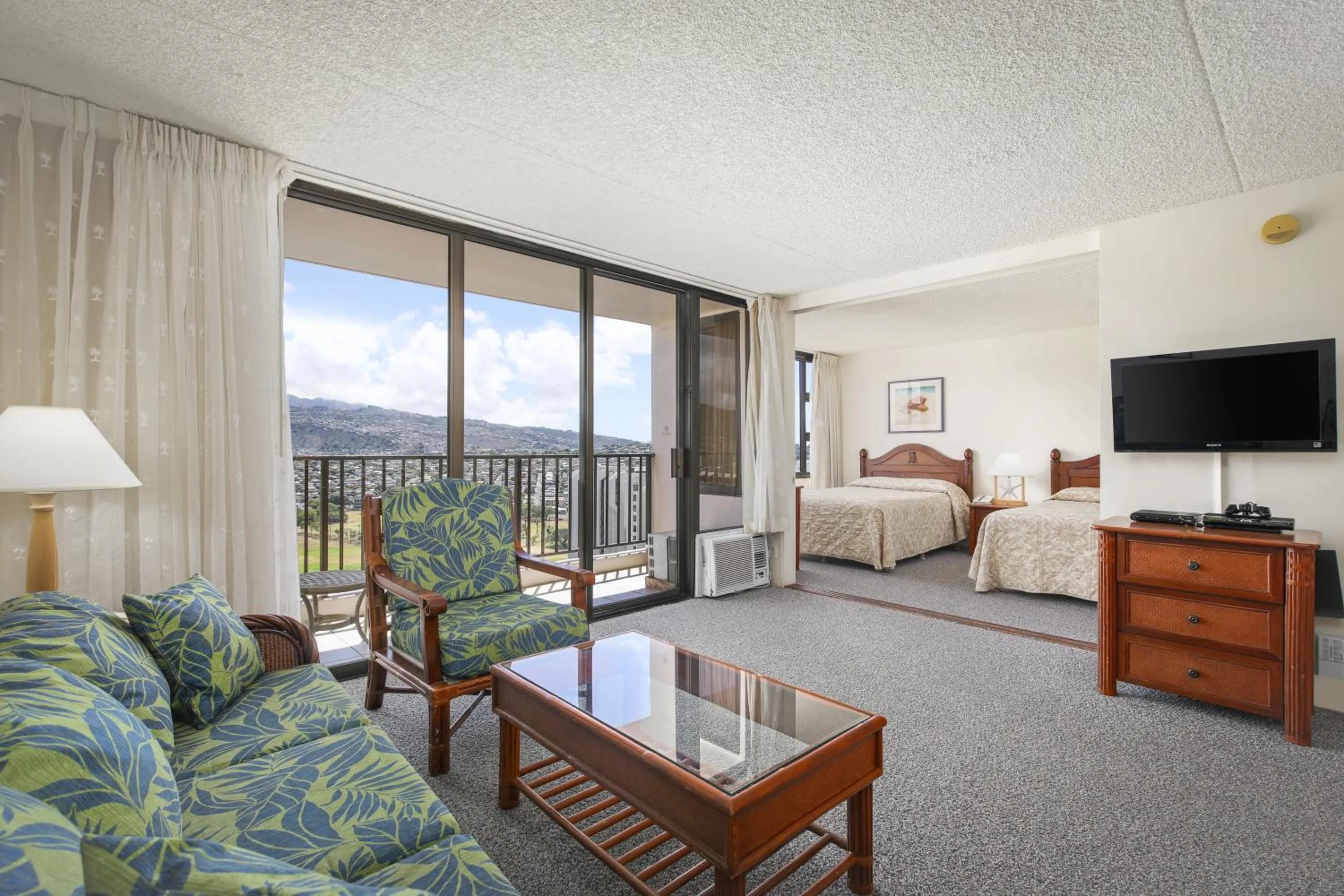 Bed in Aston at the Waikiki Banyan