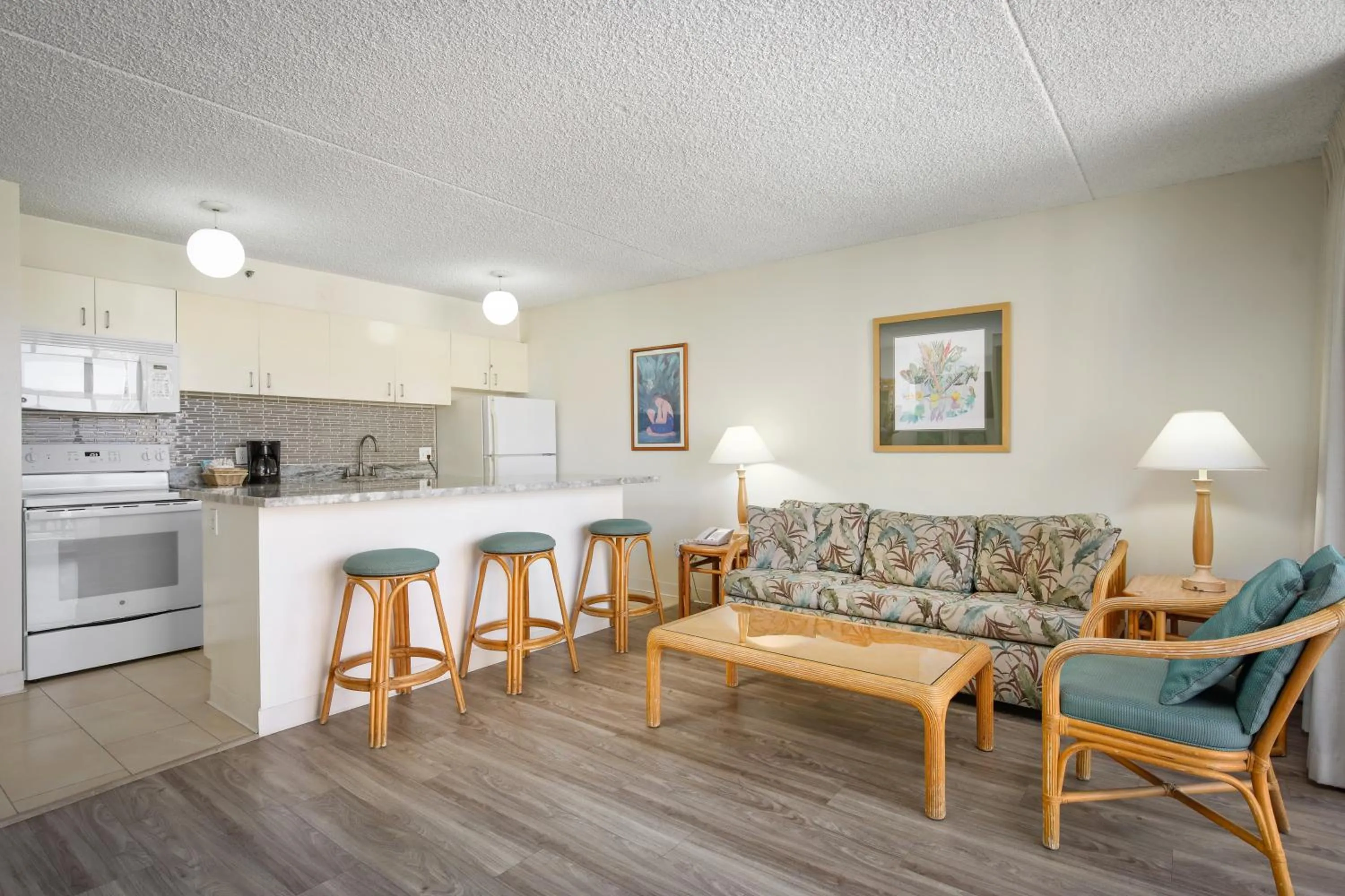 Kitchen or kitchenette in Aston at the Waikiki Banyan