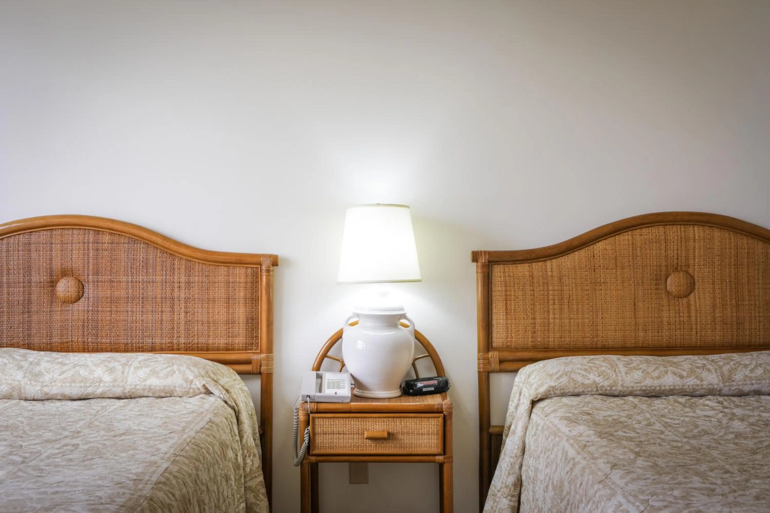 Bed in Aston at the Waikiki Banyan