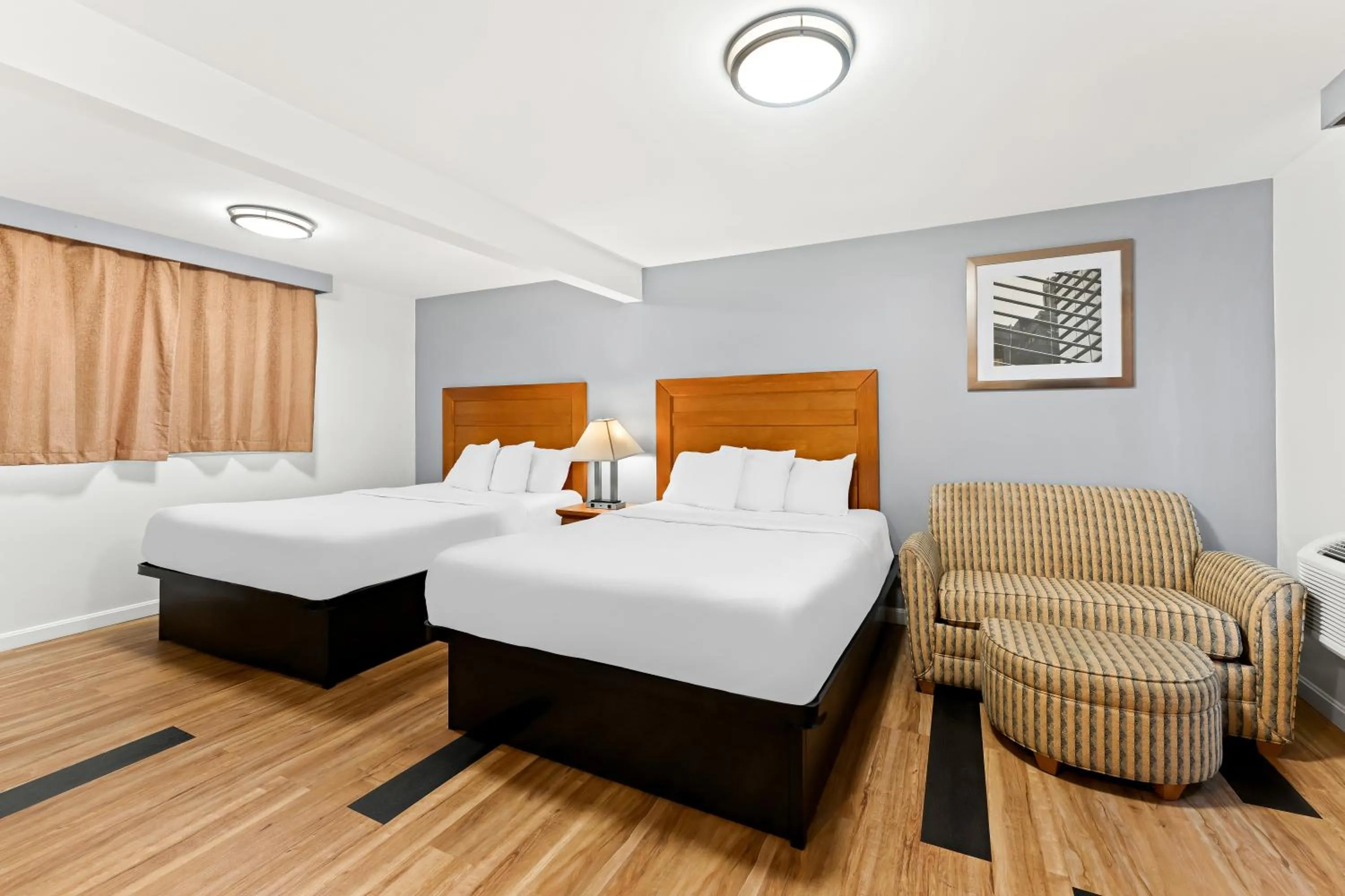 Bed in Americas Best Value Inn Stonington Mystic