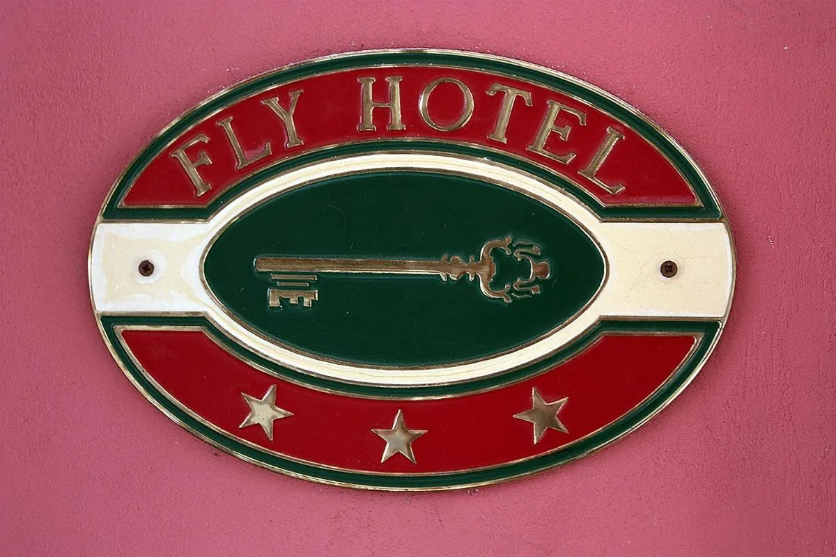 Property logo or sign in Hotel Fly