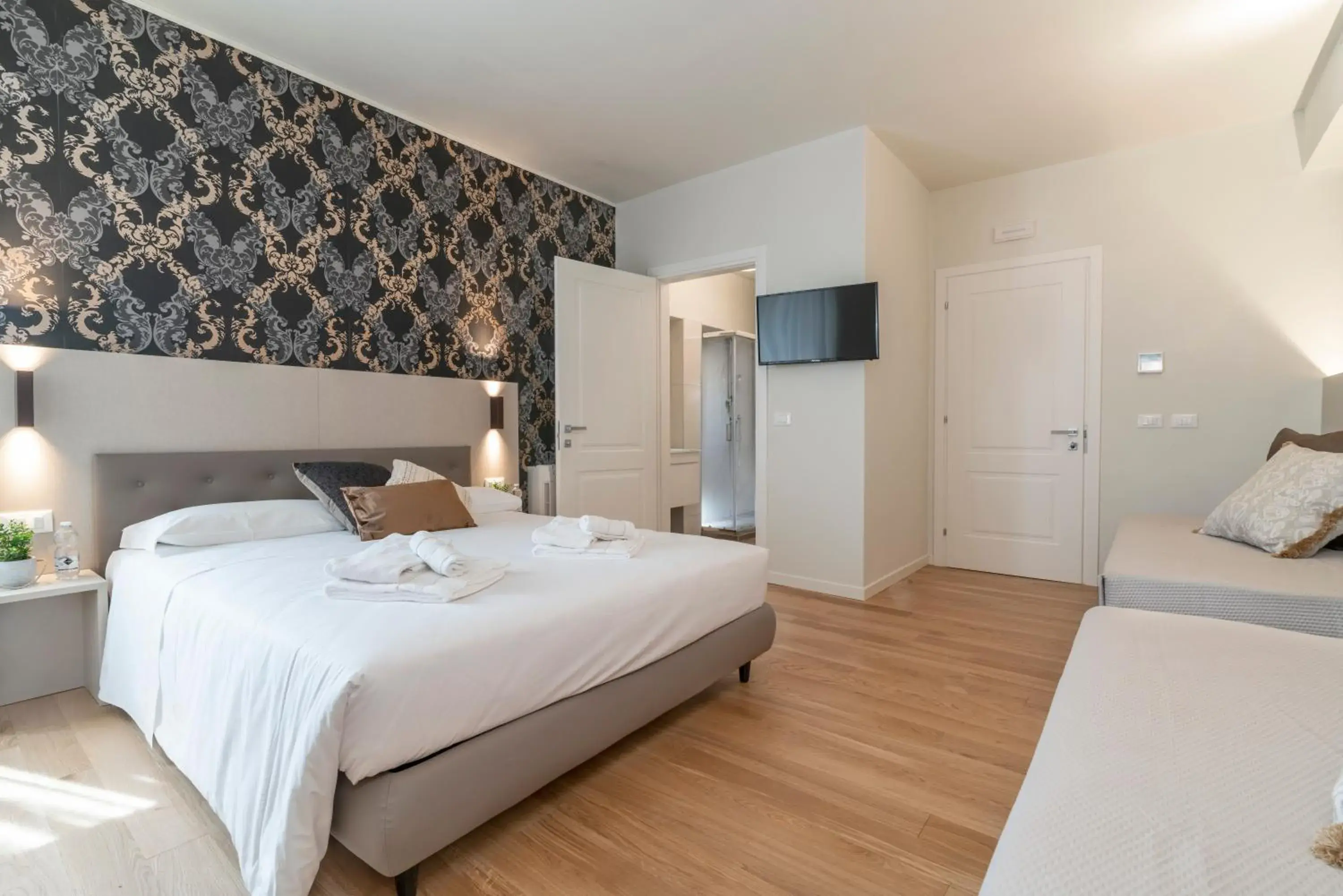 Luxury Triple Room in Hotel Grifoni Luxury Triple Room in Hotel Grifoni