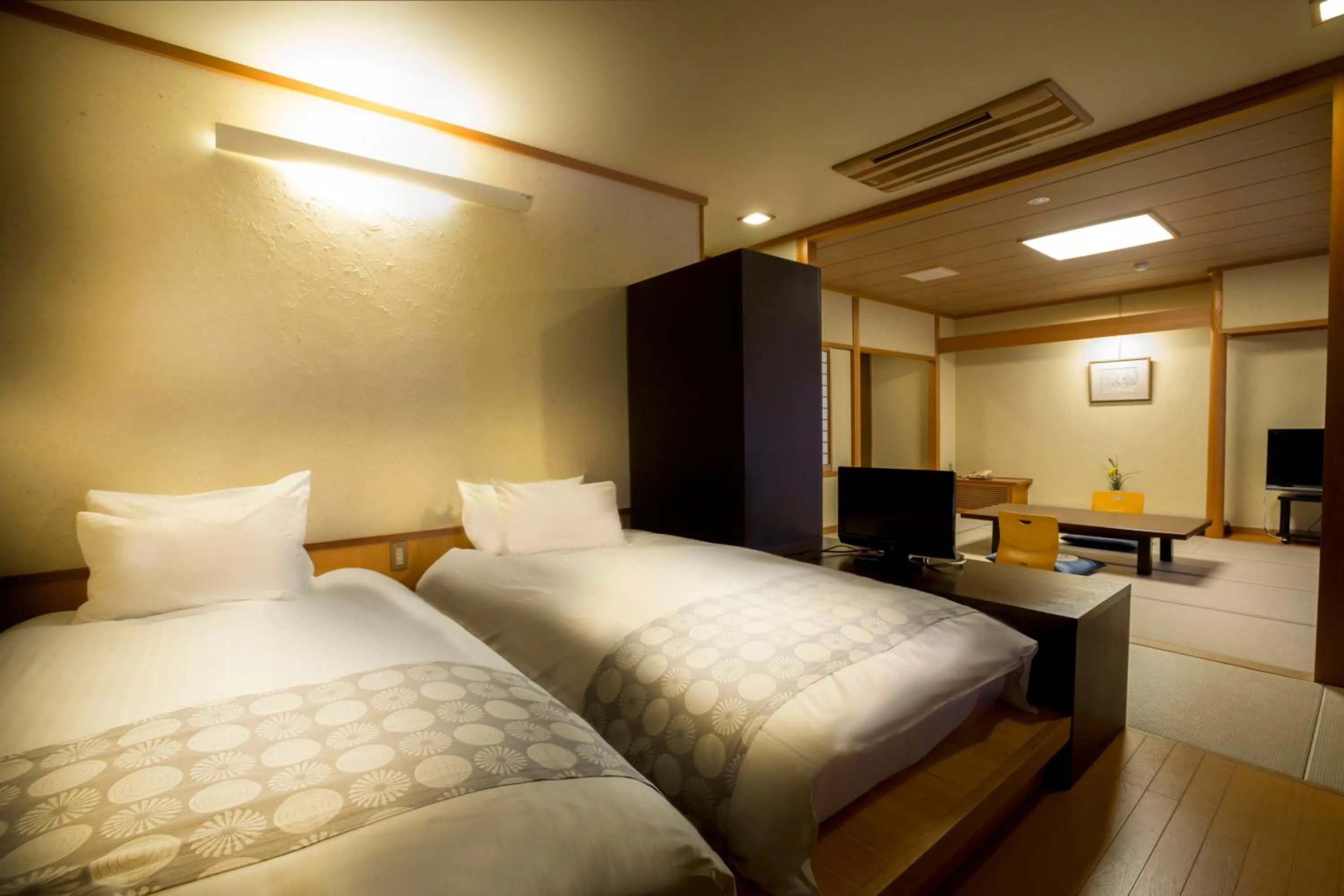 Bed in Hotel Kitanoya