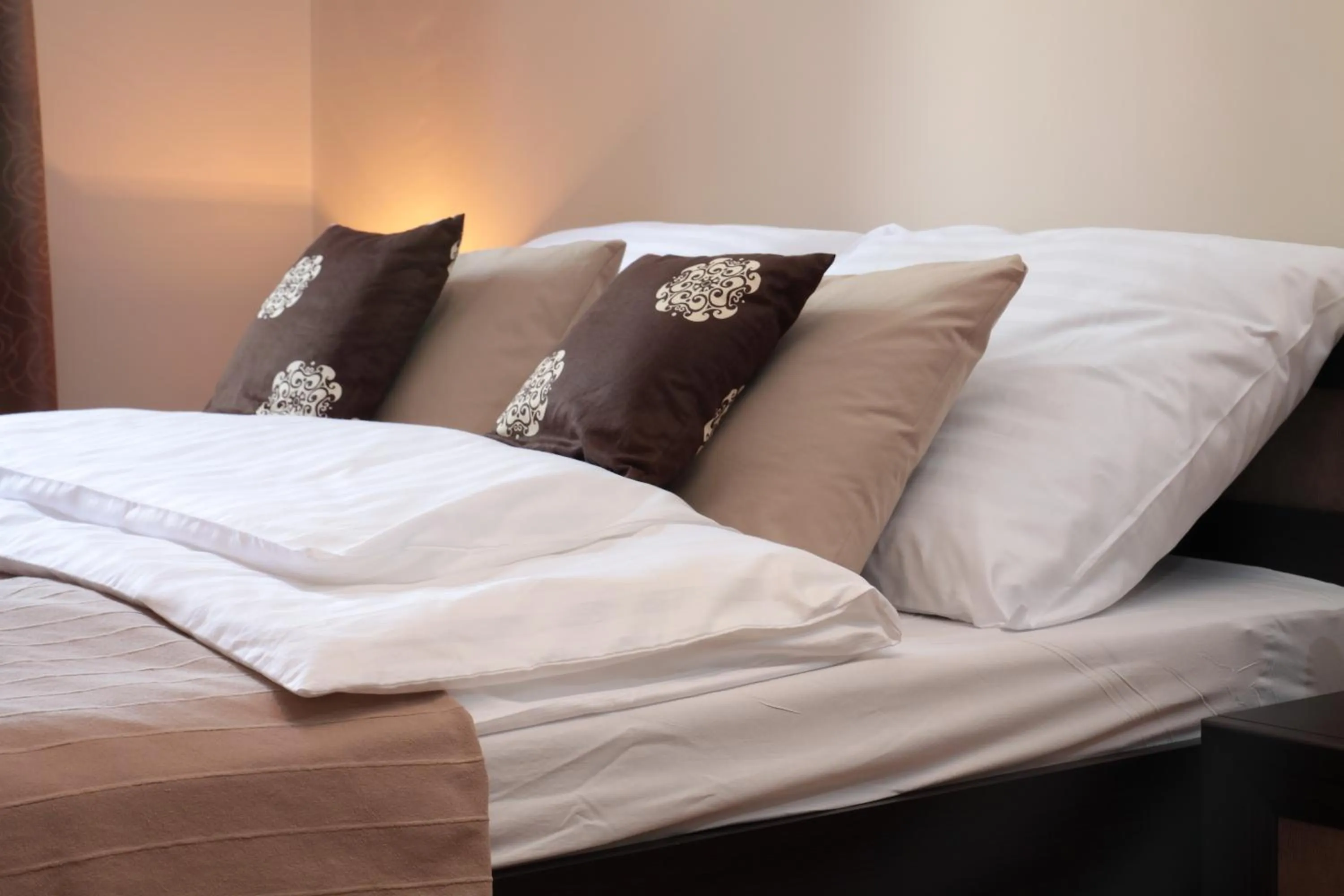 Bed in Glam House Apartments