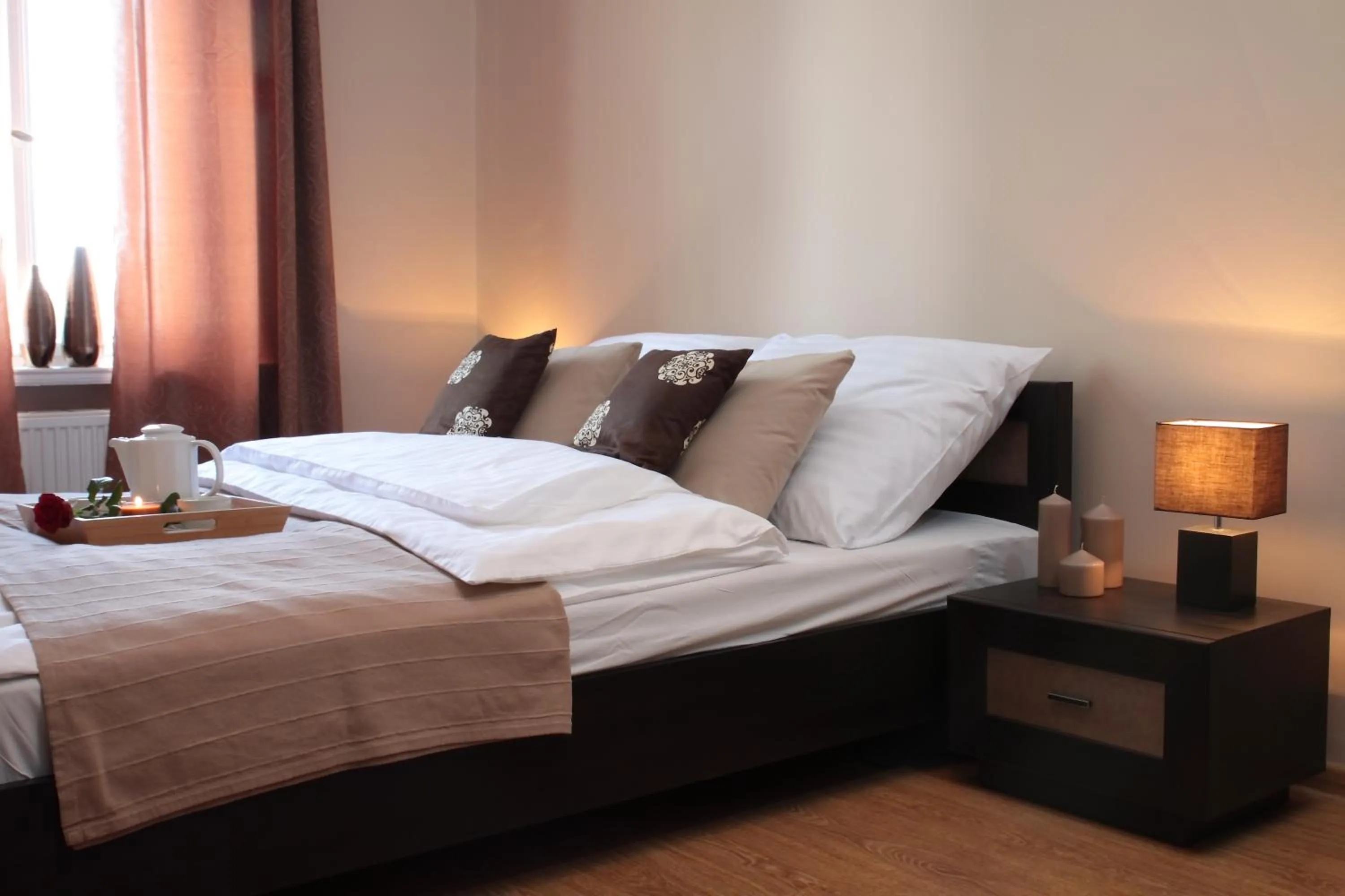 Bed in Glam House Apartments