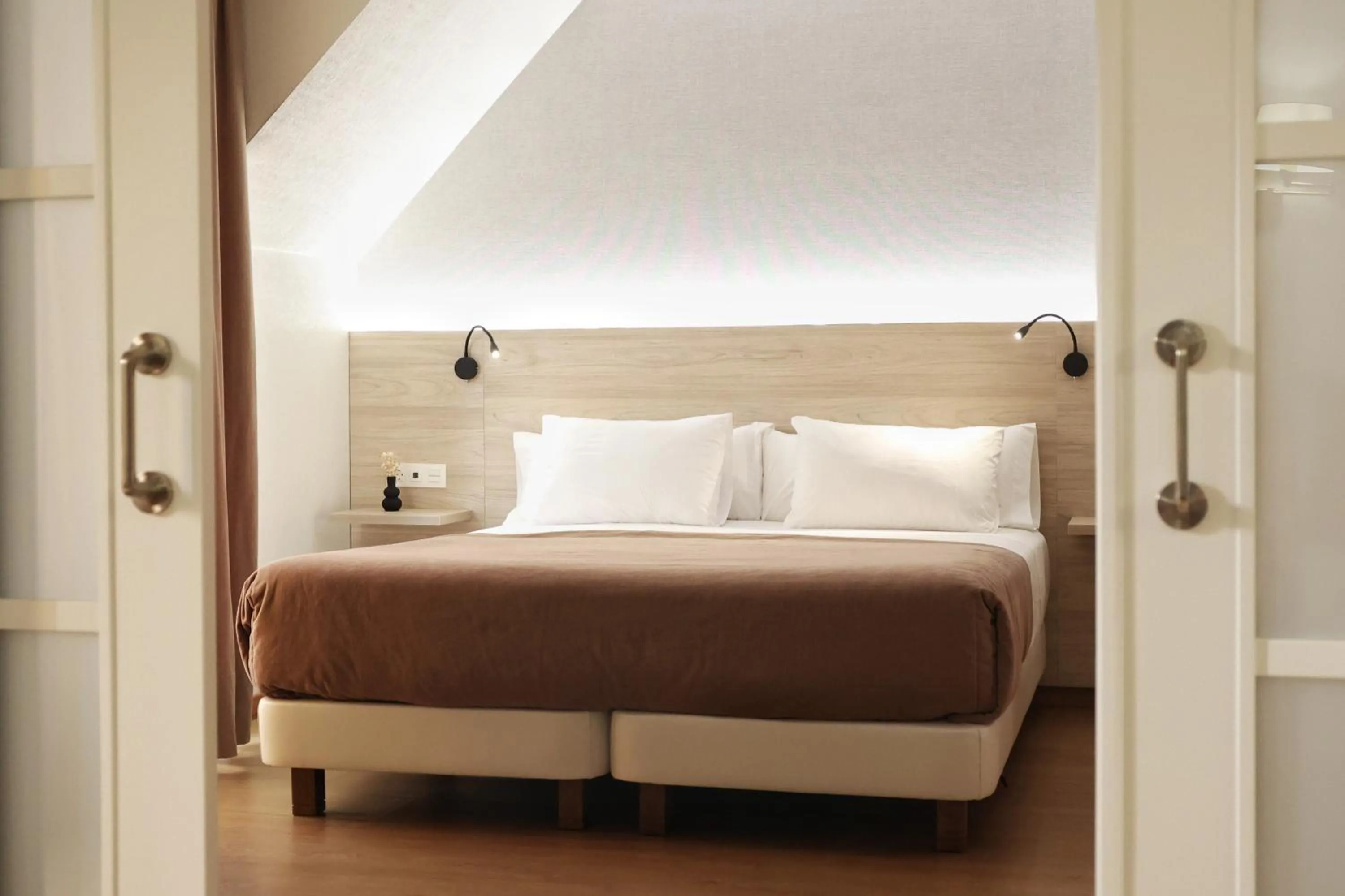 Photo of the whole room, Bed in Hotel Maruxia *** Superior