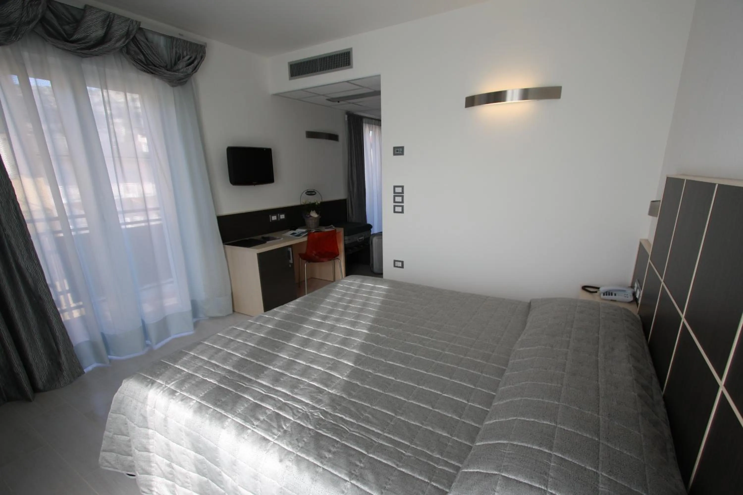 Photo of the whole room, Bed in Hotel Garnì Corallo