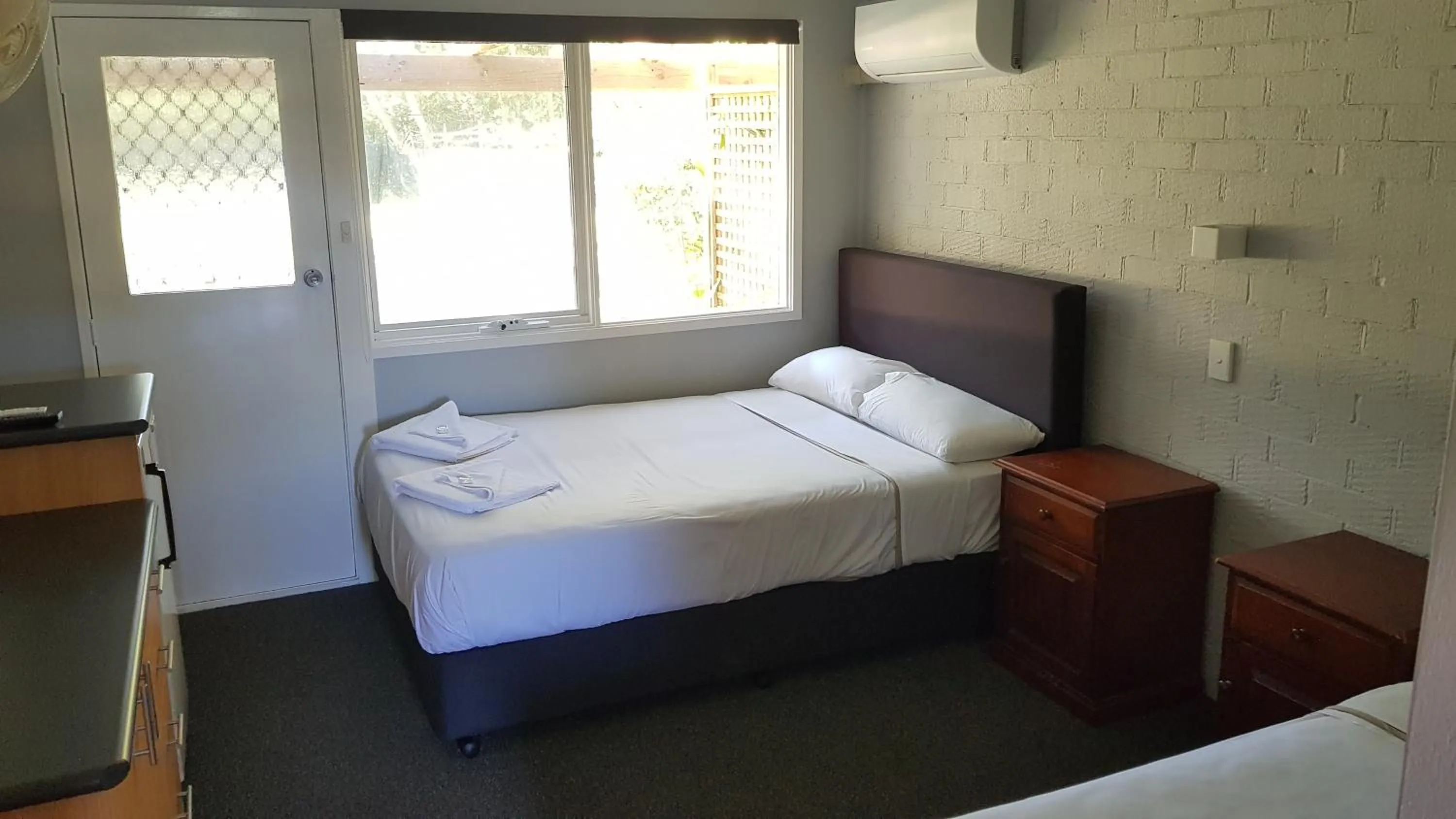 Bed in Bateau Bay Hotel