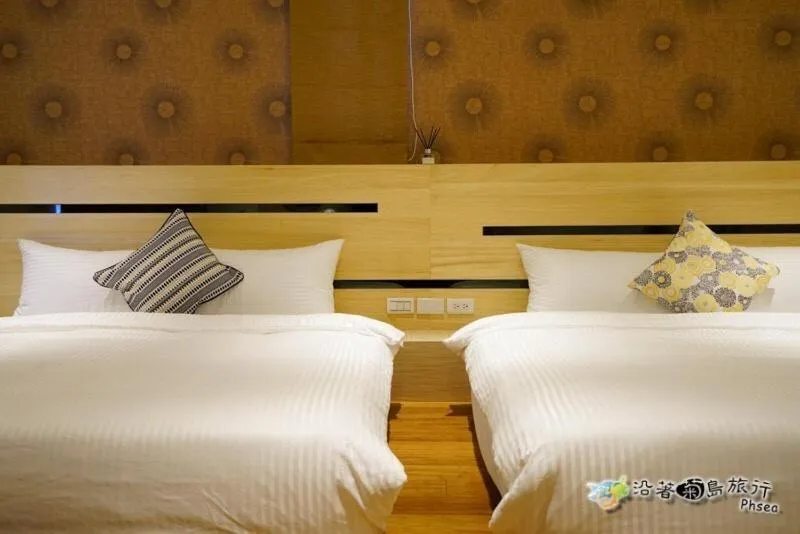 Bed in CHEN FENG HOMESTAY