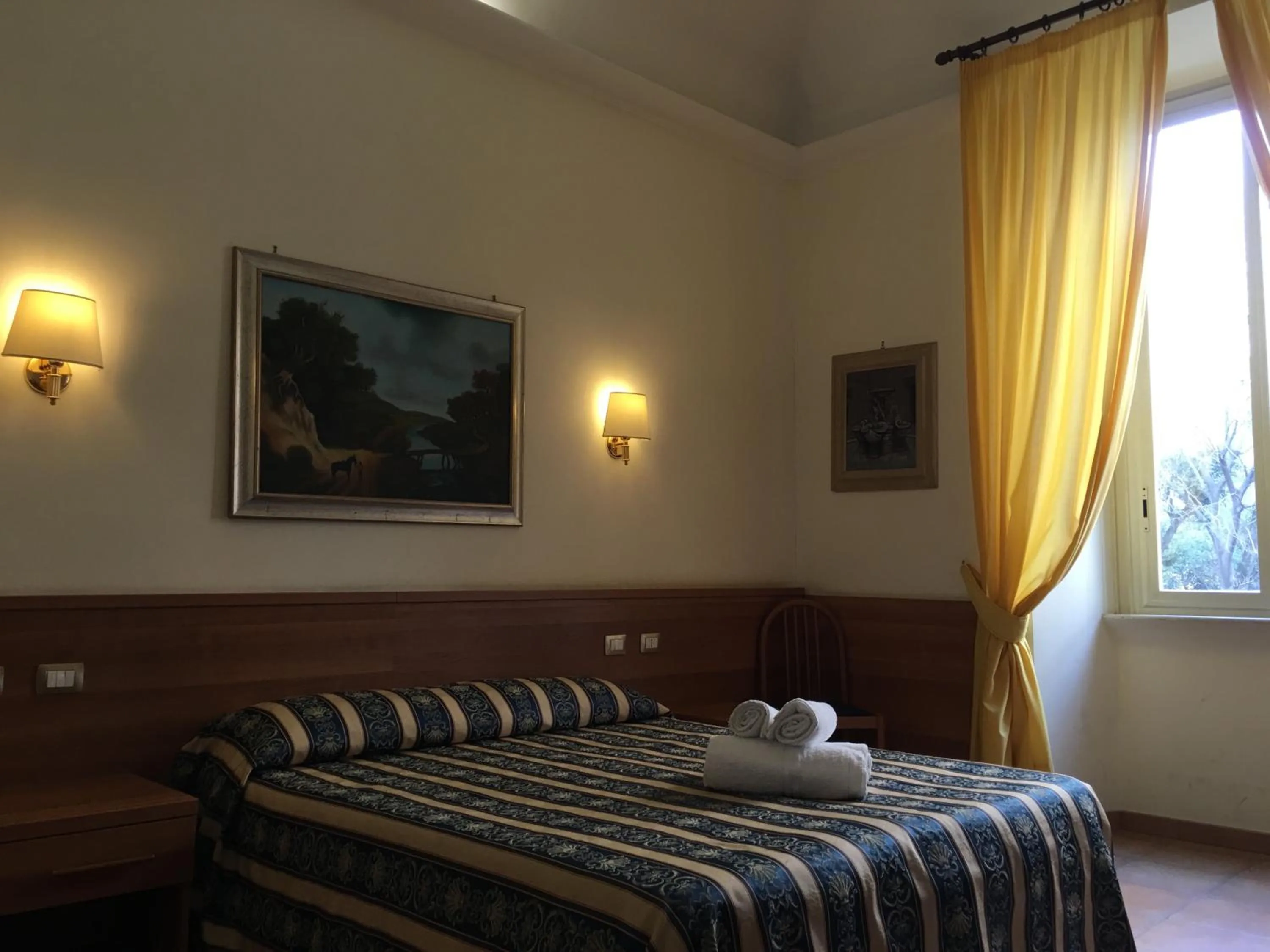 Bed in Hotel Bolognese
