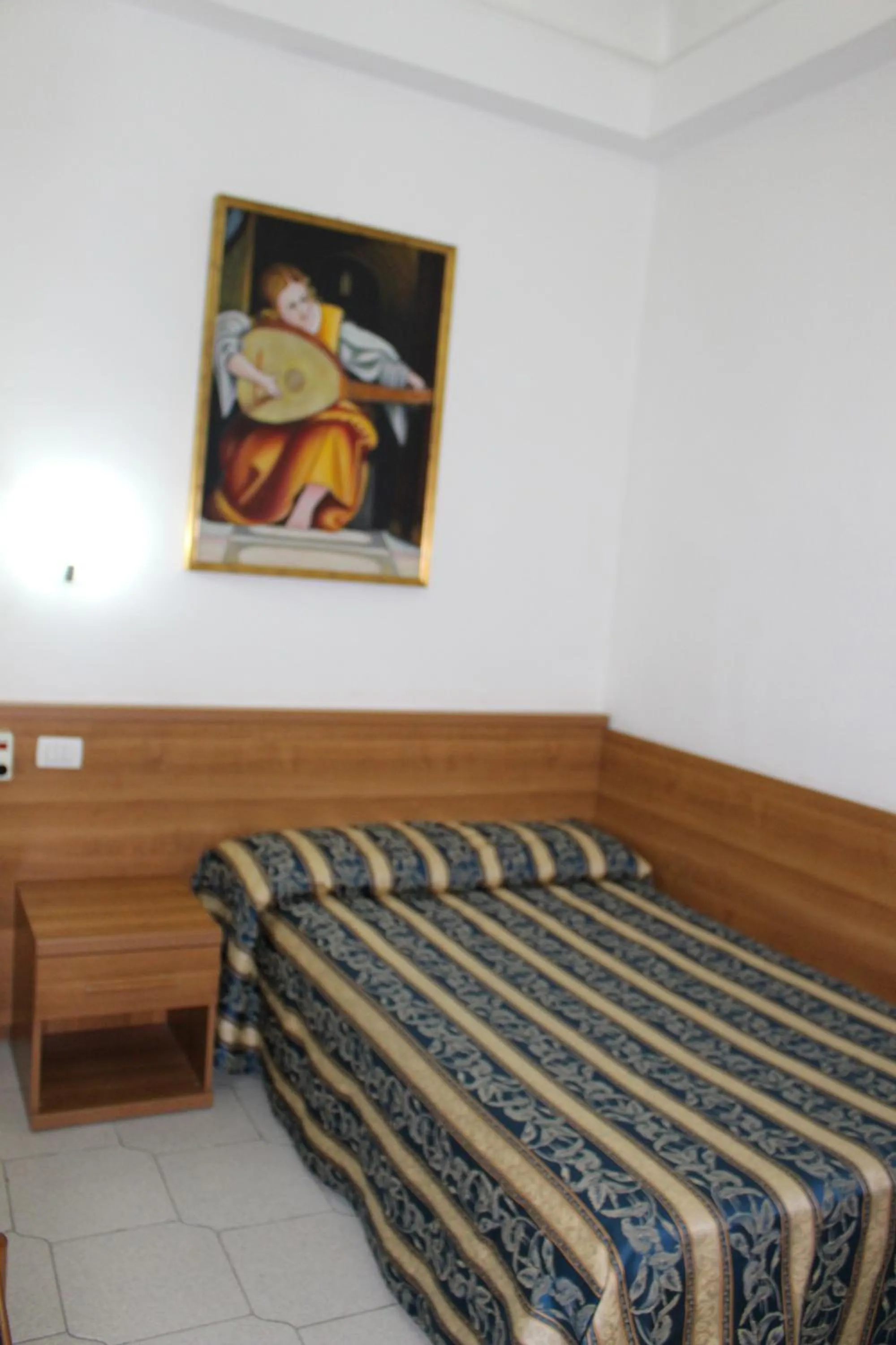 Bed in Hotel Bolognese