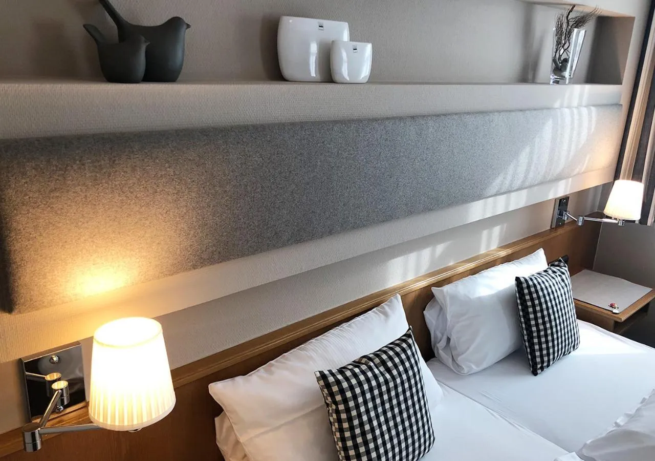 Bed in Mangolds Boutique Hotel & Fruehstuecksmeisterei