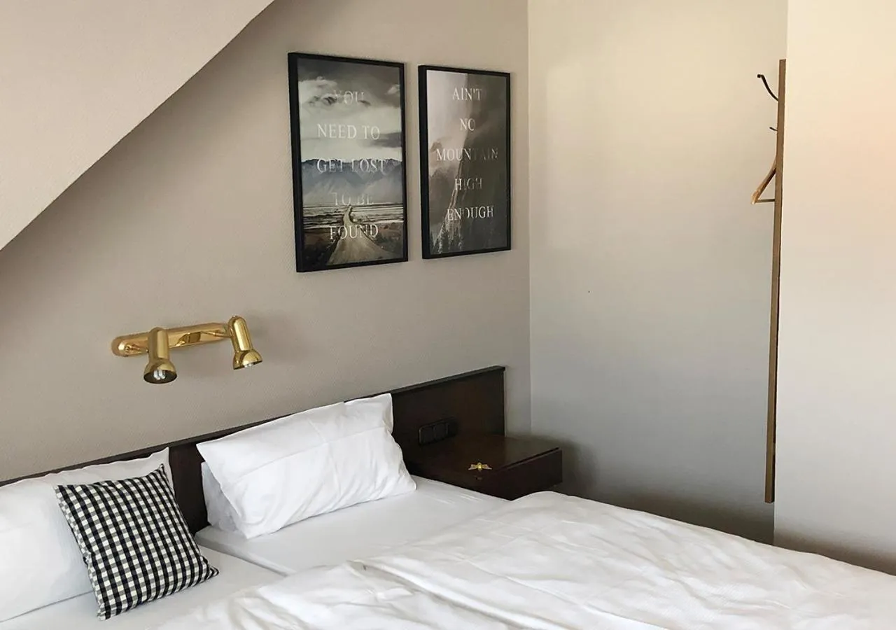 Bed in Mangolds Boutique Hotel & Fruehstuecksmeisterei