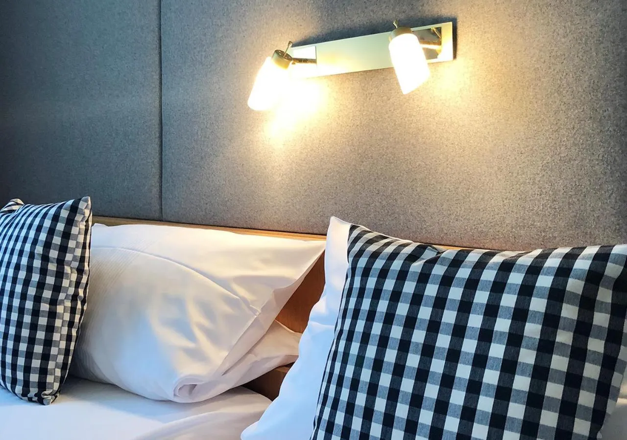 Bed in Mangolds Boutique Hotel & Fruehstuecksmeisterei