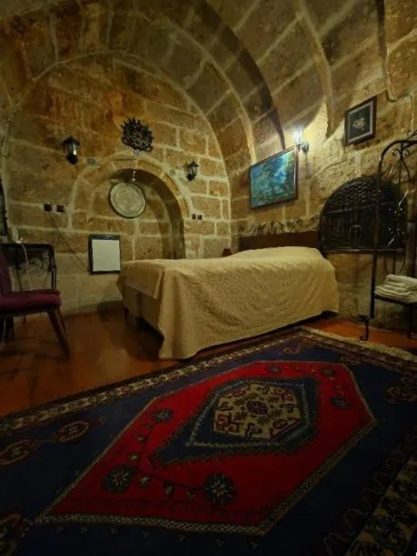 Photo of the whole room, Bed in Kapadokya Ihlara Konaklari & Caves