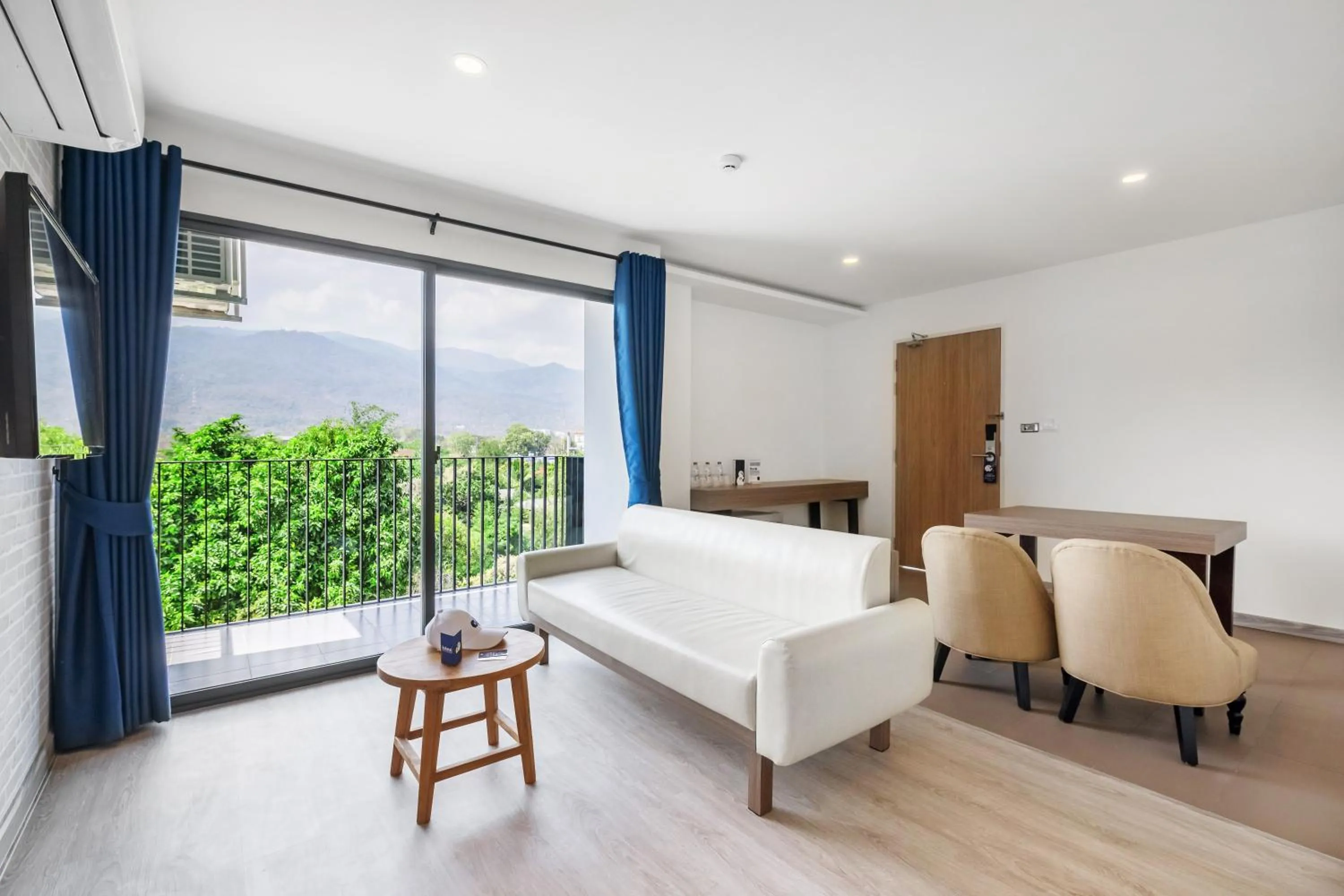 Living room, Bed in Kokotel Chiang Mai Nimman