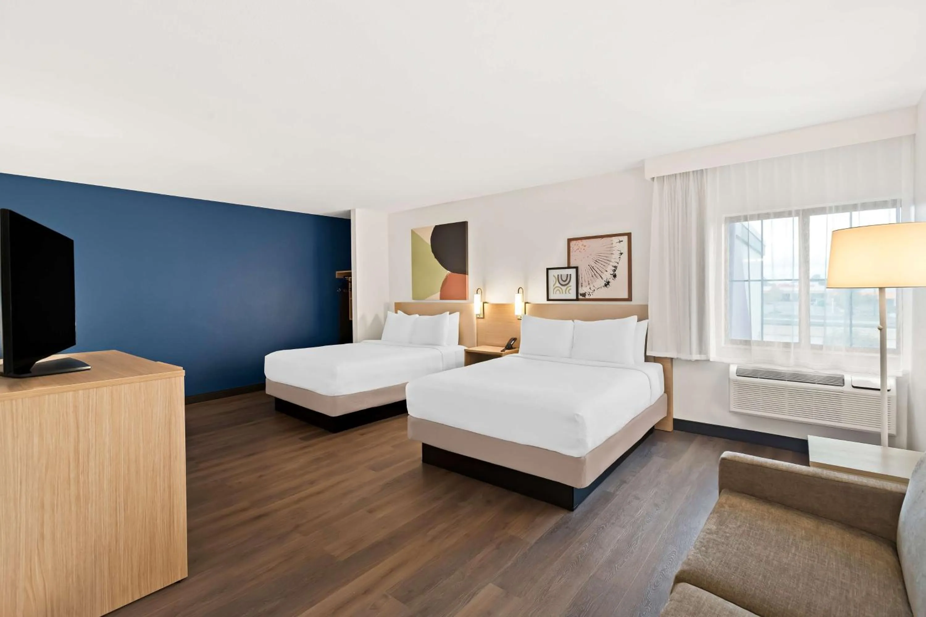 Living room, Bed in Super 8 by Wyndham Wichita East