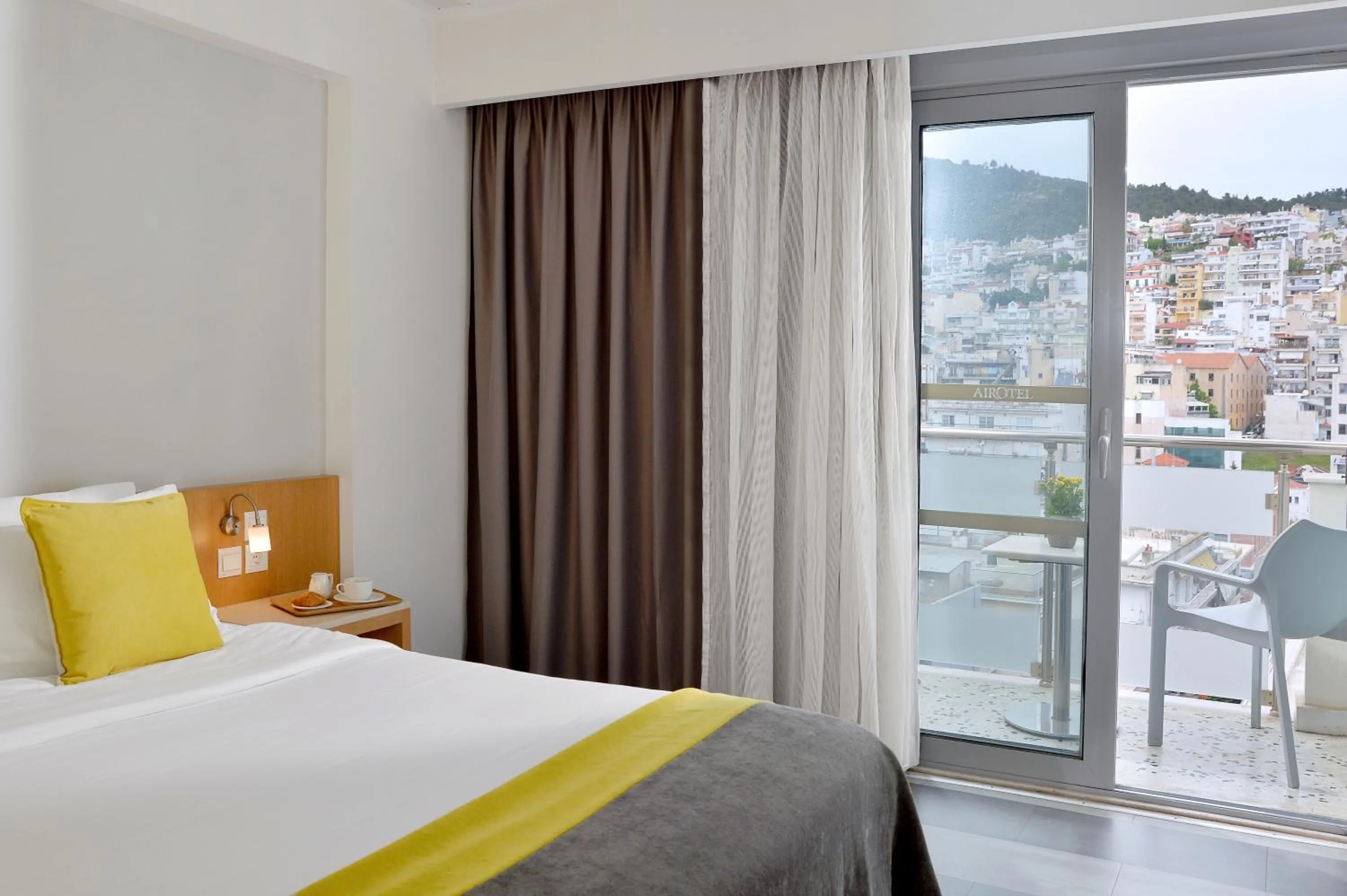 View (from property/room), Bed in Airotel Galaxy