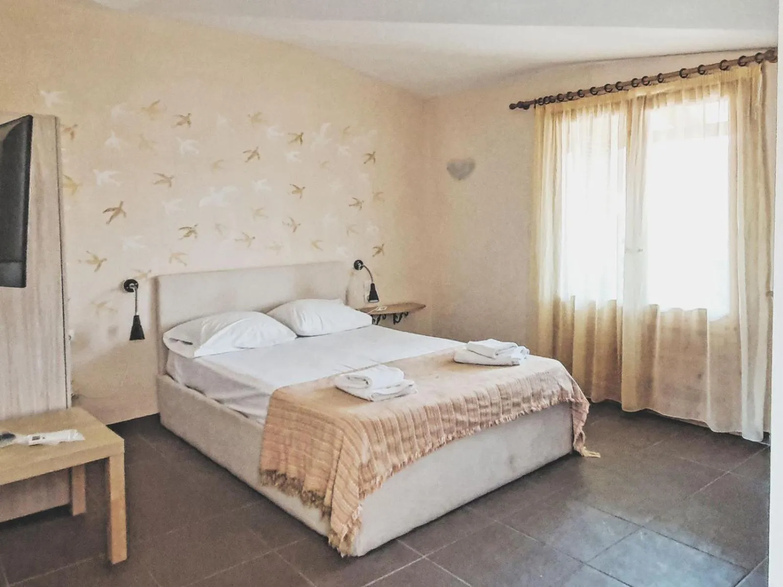 Bed in Ammon Garden Hotel