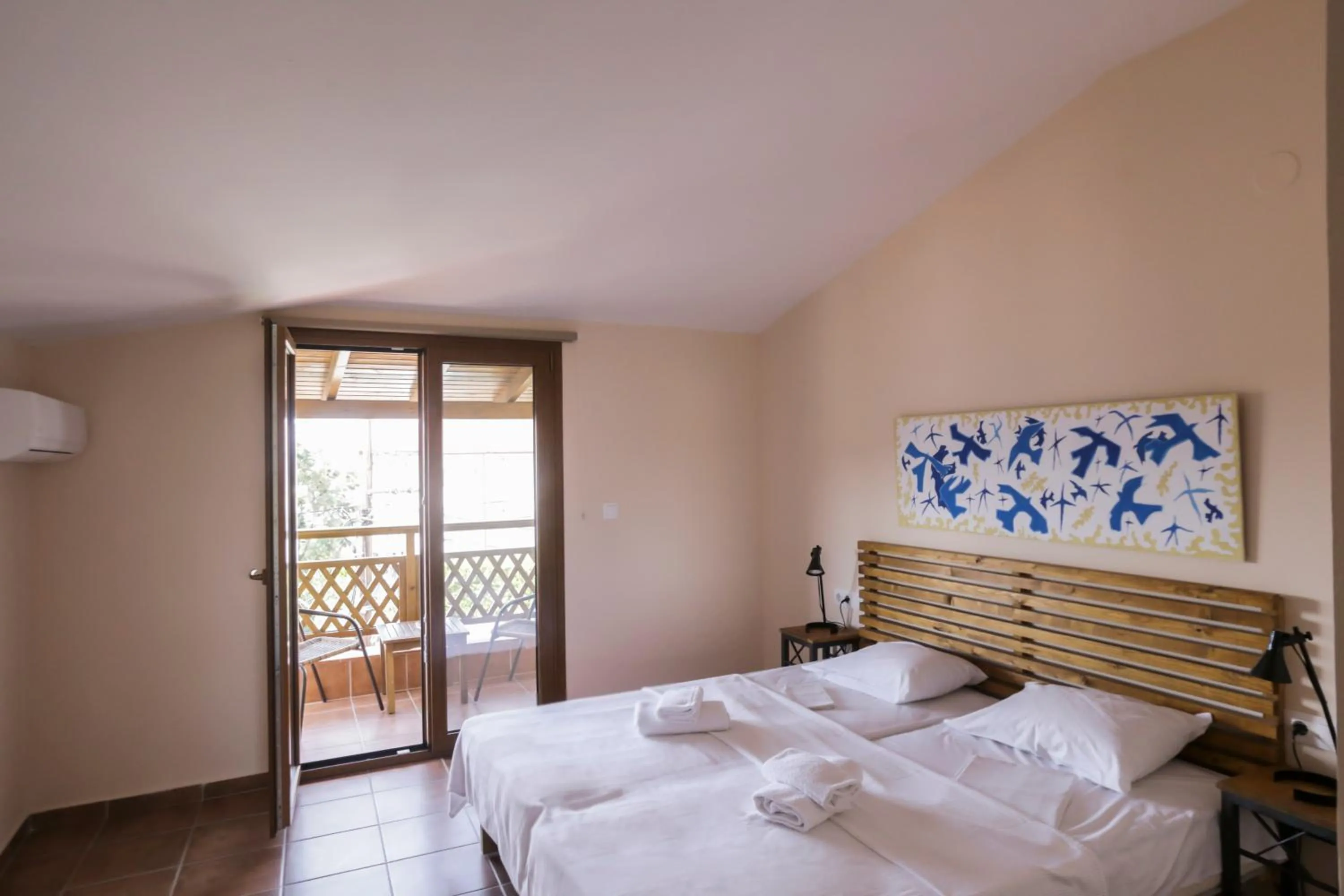 Bed in Ammon Garden Hotel