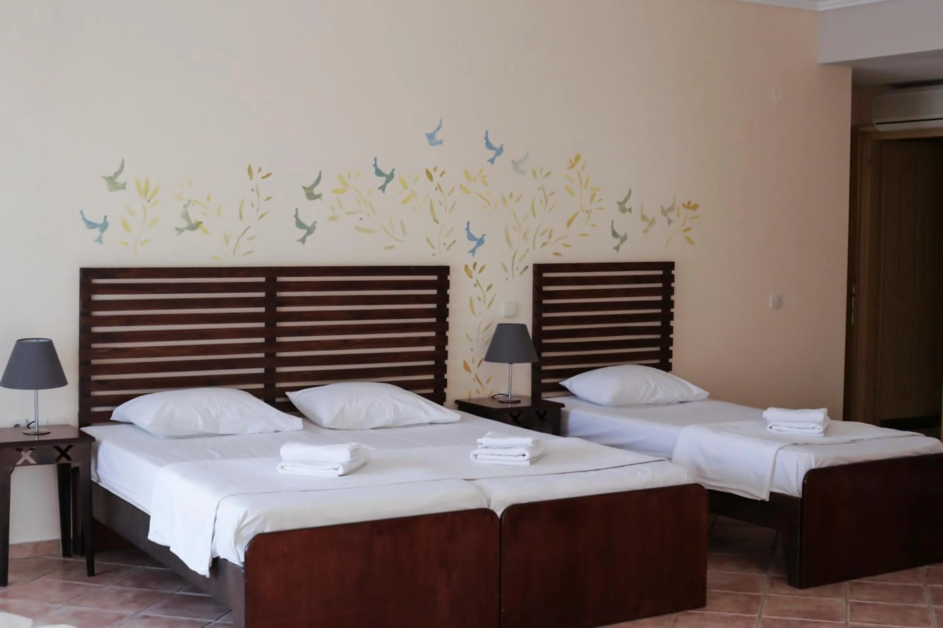 Bed in Ammon Garden Hotel