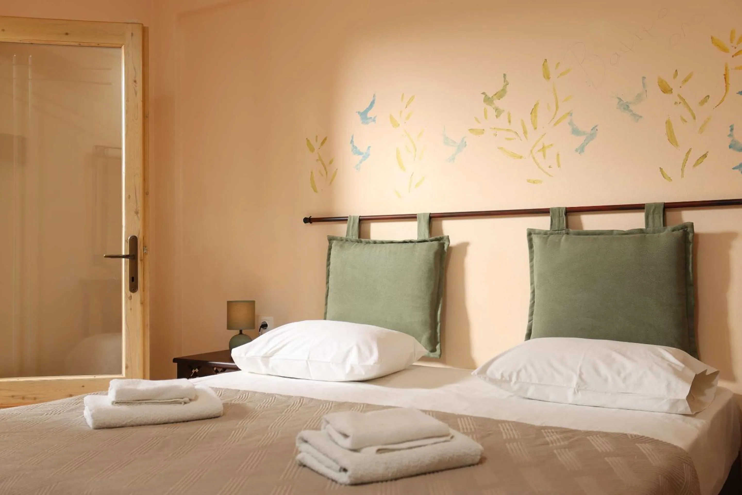 Bed in Ammon Garden Hotel