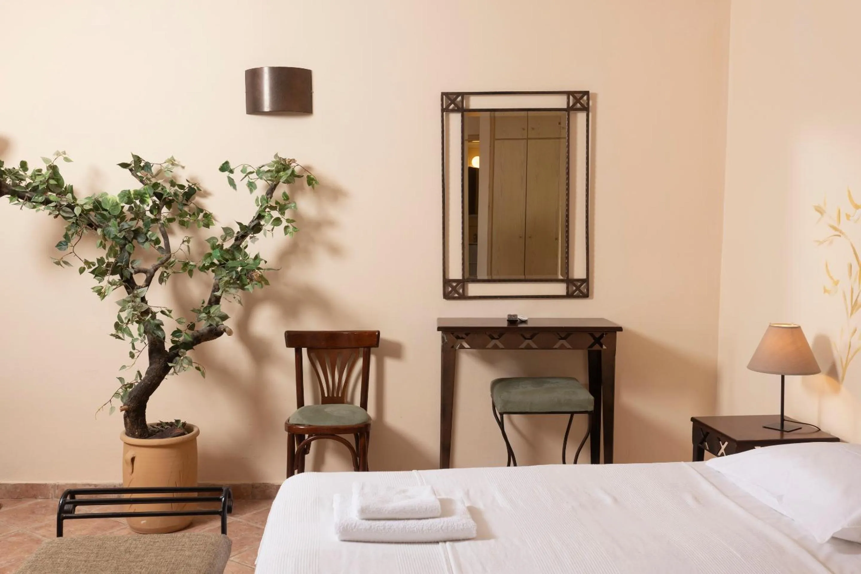 Bed in Ammon Garden Hotel