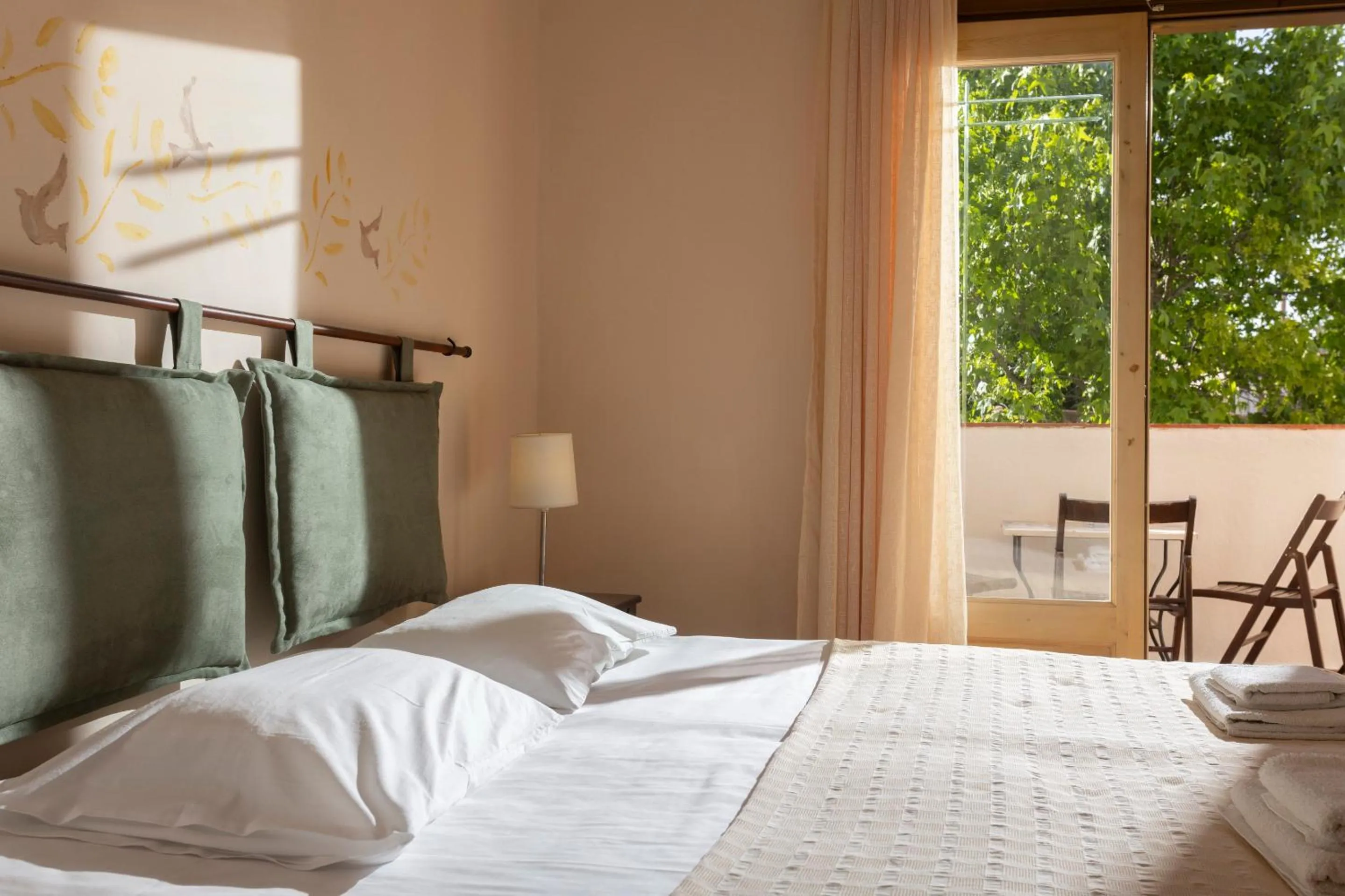 Bed in Ammon Garden Hotel