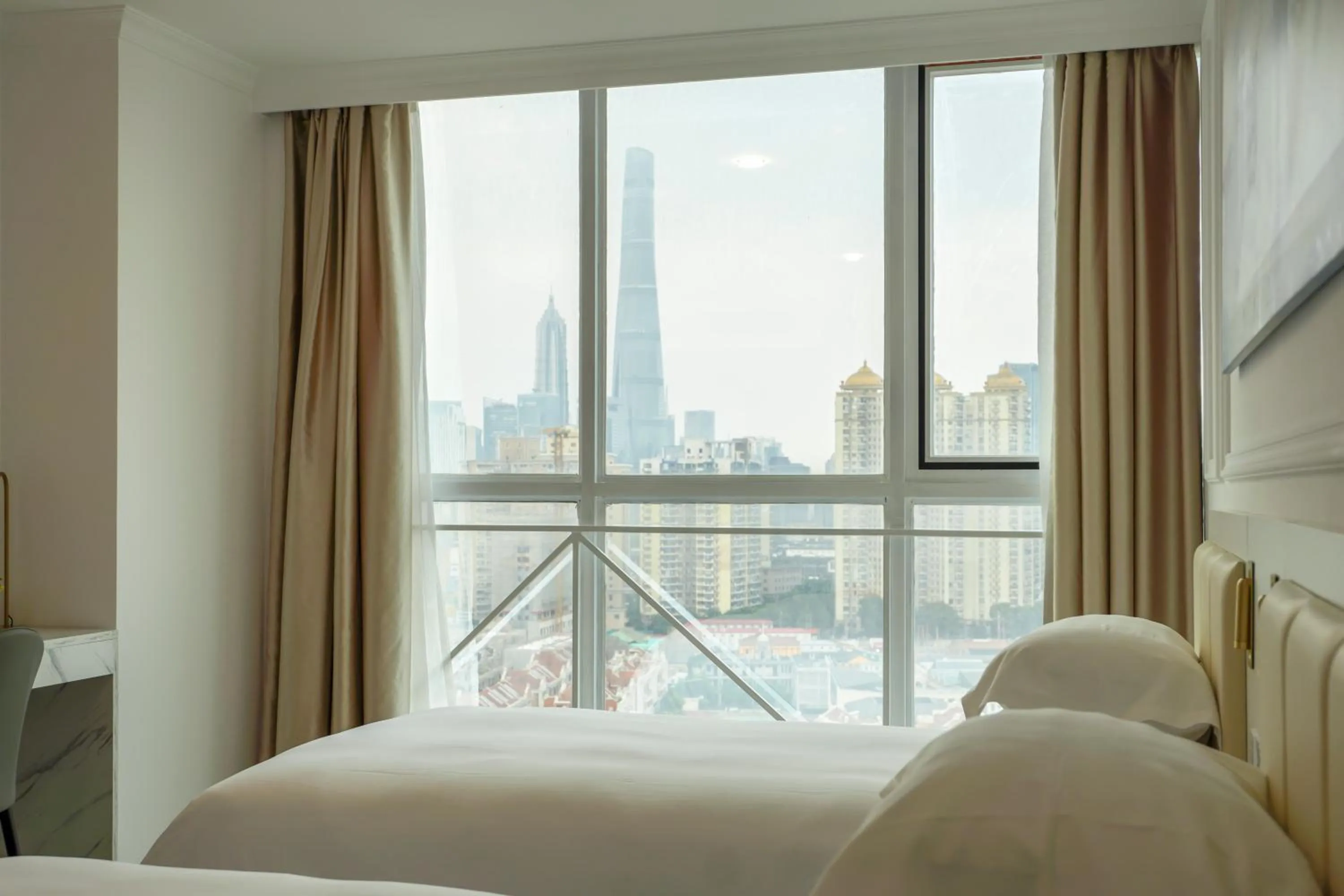 Property building, Bed in Magnificent International Hotel