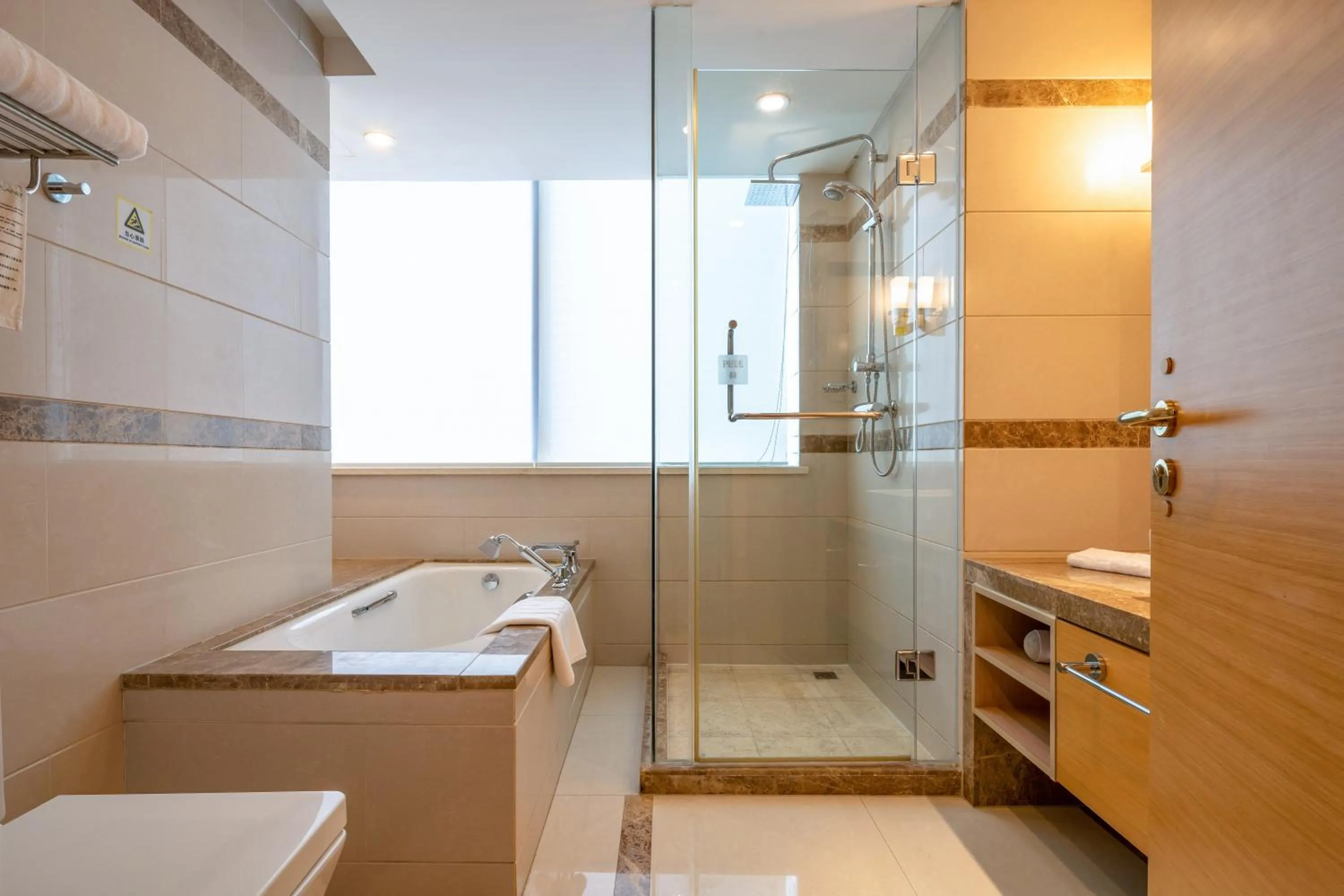 Bathroom in Regal Plaza Hotel & Residence