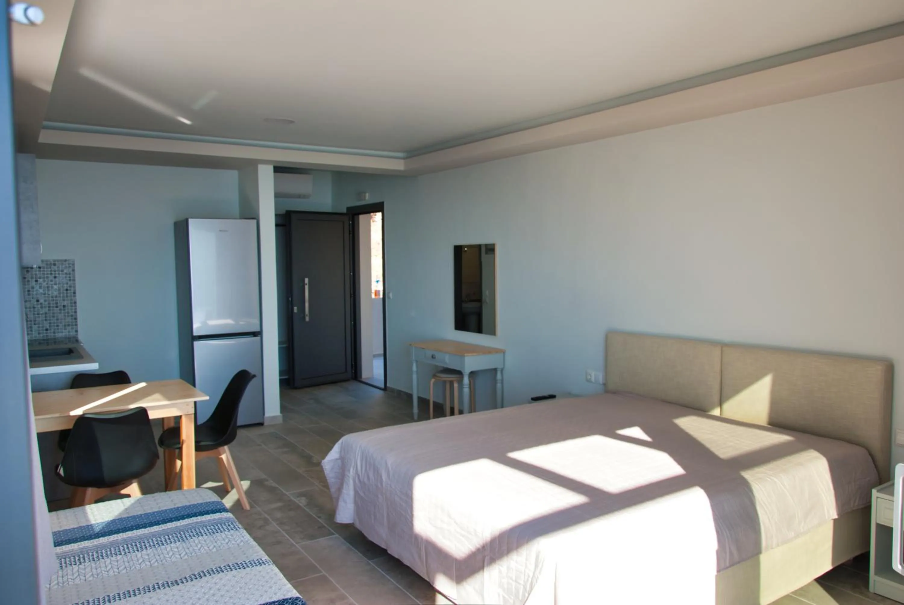 Bed in Ostria Apartments