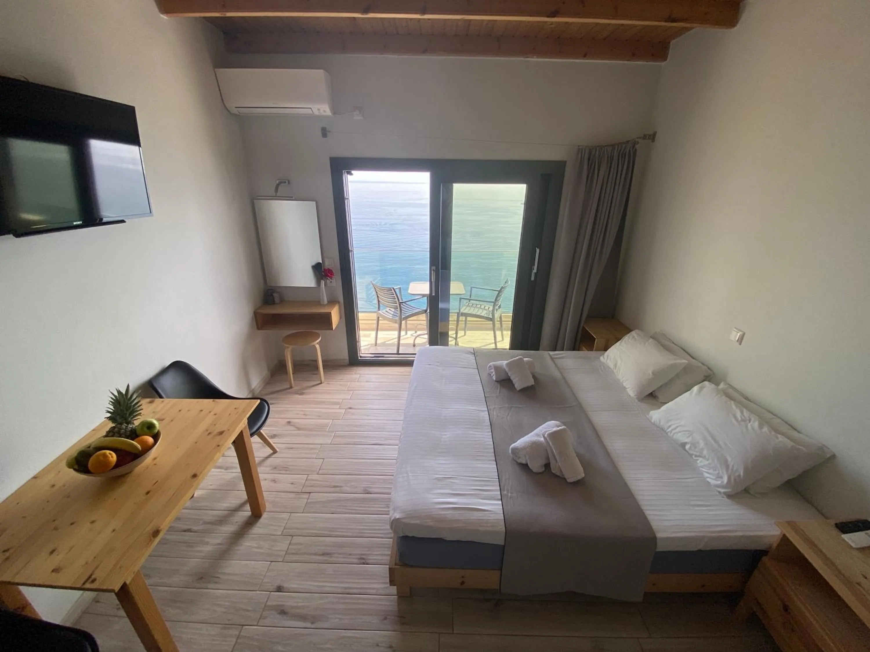 Bed in Ostria Apartments