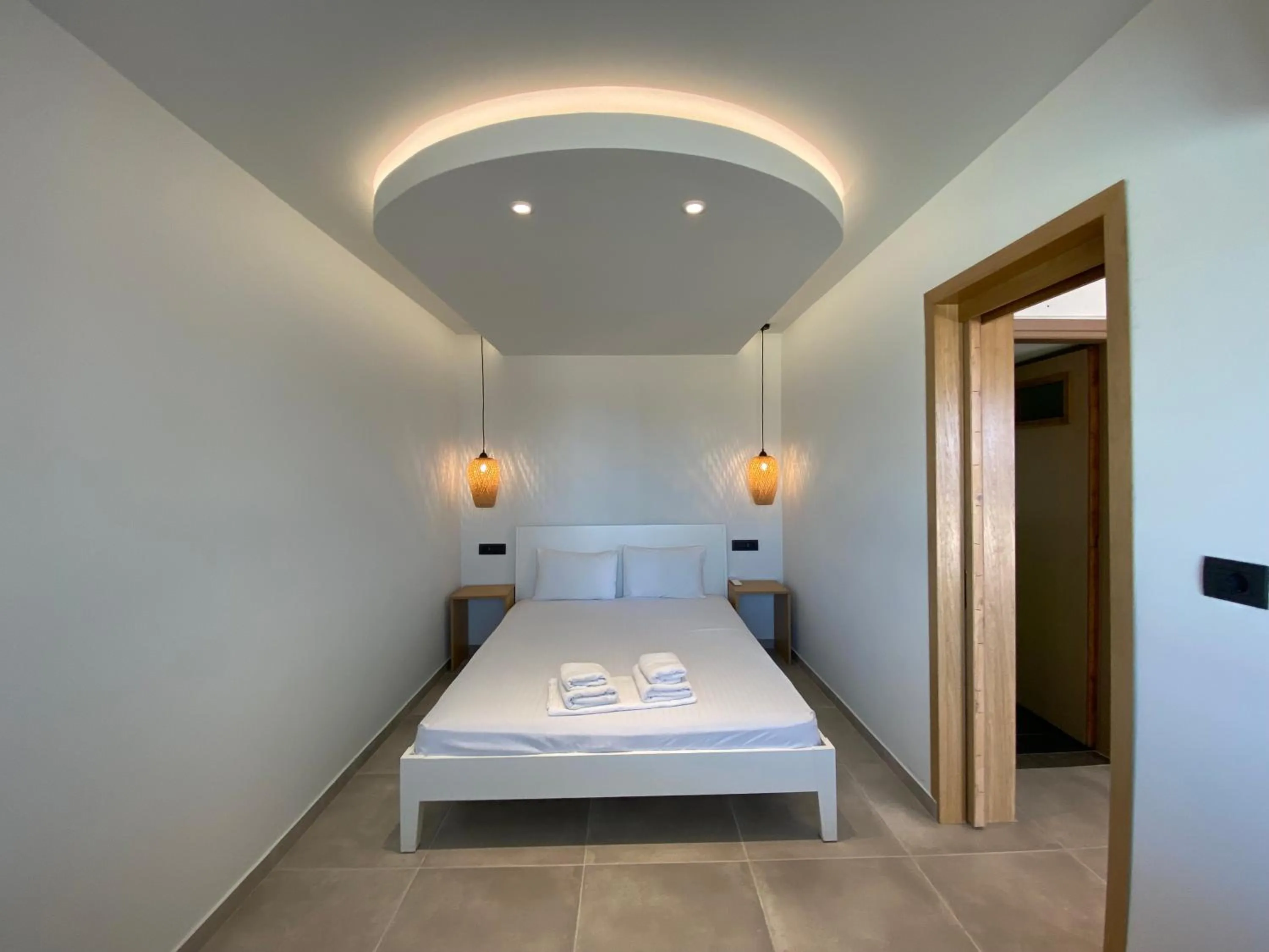 Bed in Ostria Apartments